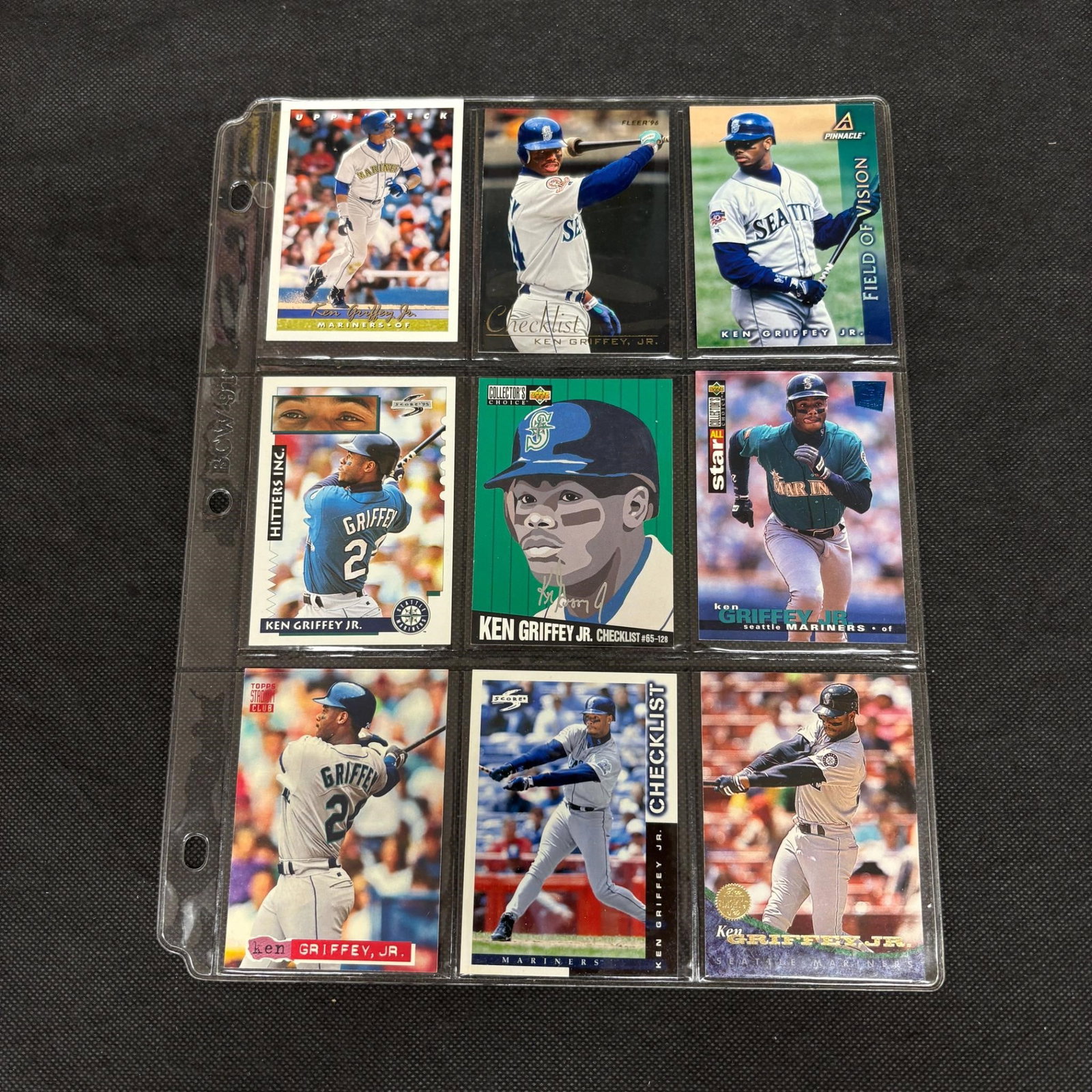 SHEET OF 9 HOF KEN GRIFFEY JR CARDS: We offer in person or virtual previews of auction lots up until the day before the auction. All items are sold as is. Please look at pictures carefully to determine what you believe are the condition 
