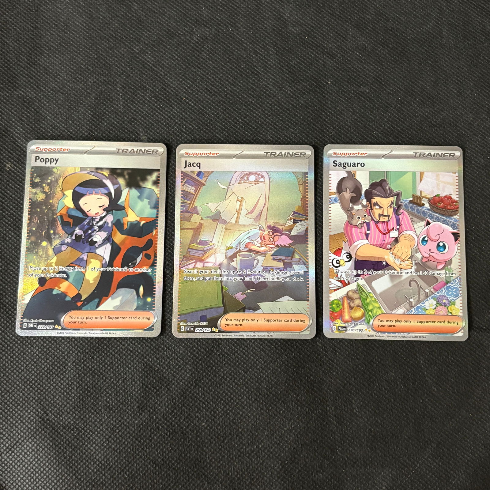 Special Illustration Rare Trainer Pokemon Cards: Includes Poppy #227 Obsidian Flames, Jacq #250 Scarlet Violet, and Saguaro #270 Paldea Evolved. We ship in-house! We ship internationally. We also offer pick up and we offer a discount for cash paymen