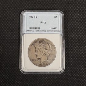 NNC F-12 Peace Dollar 1934-S