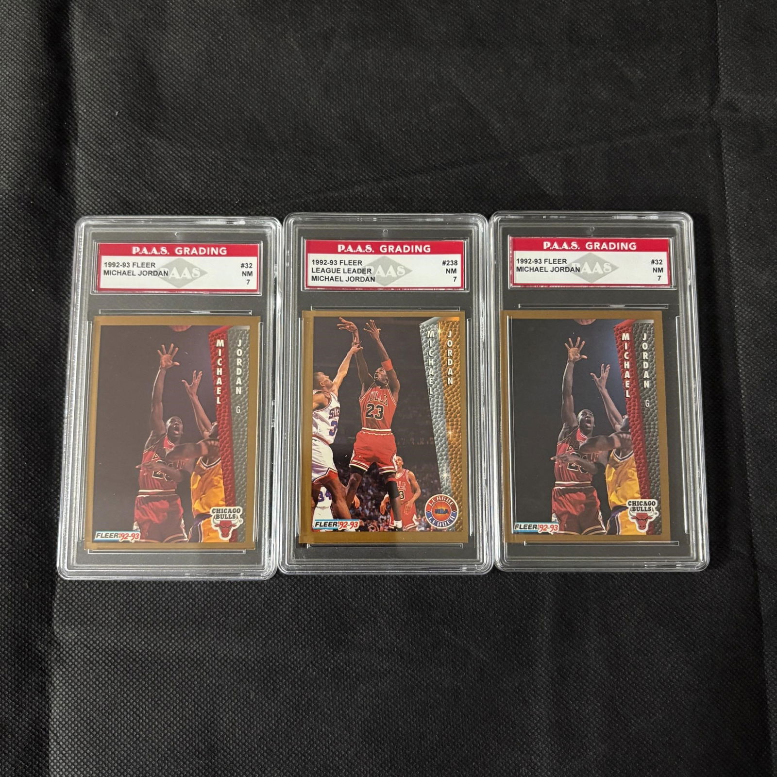 Graded Fleer Michael Jordan Basketball Cards: PAAS 7 Michael Jordan #32 1991-93 Fleer, PAAS 7 Michael Jordan #238 League Leader 1992-93 Fleer, PAAS 7 Michael Jordan #32 1992-93 Fleer. We ship in-house! We ship internationally. We also offer pick