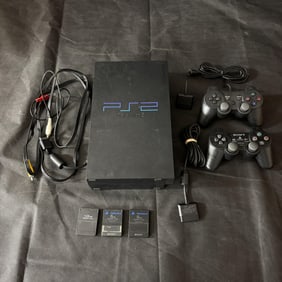Playstation 2 w/ Controllers and Memory Cards