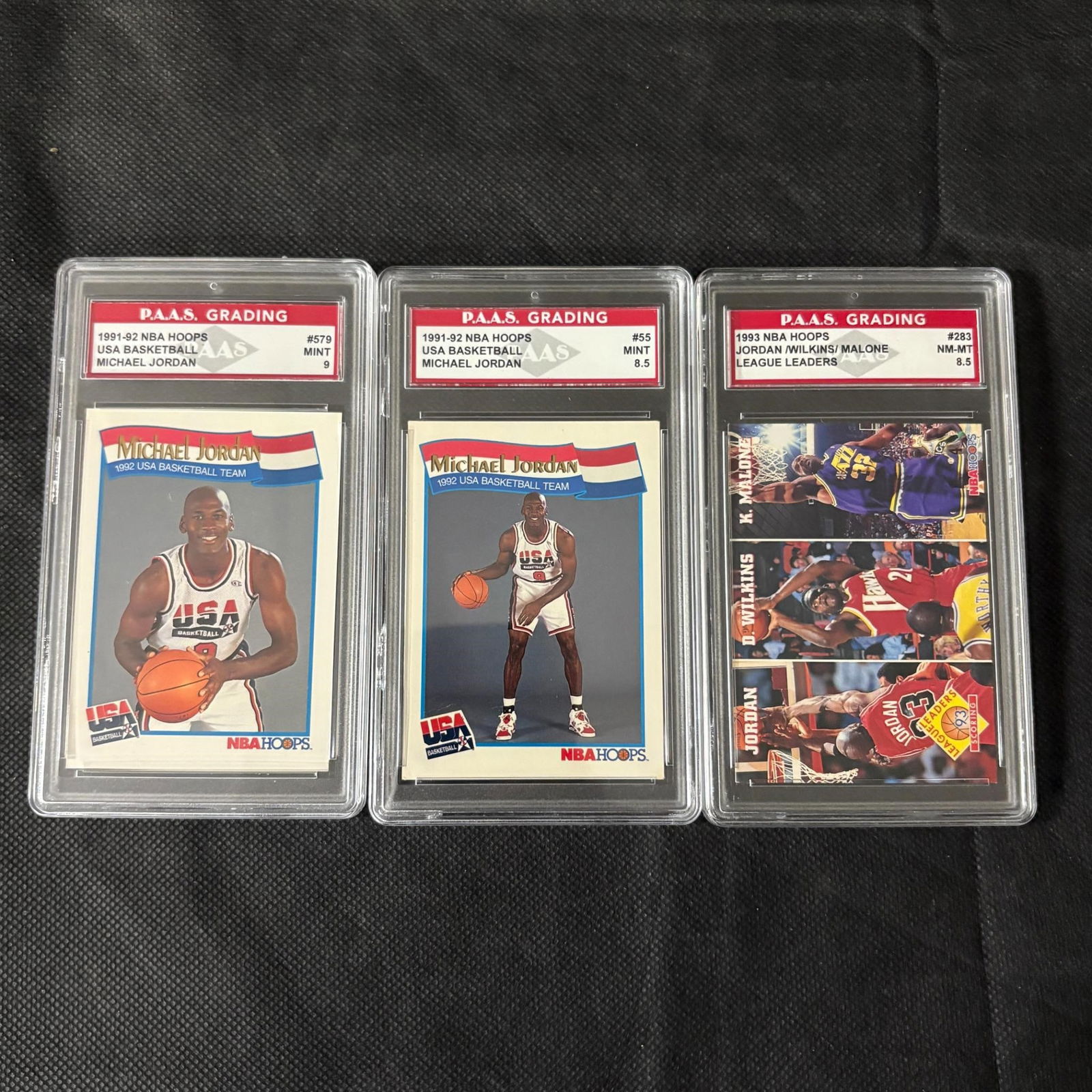 Graded Michael Jordan NBA Hoops Cards: PAAS 9 Michael Jordan #579 USA Basketball 1991-92 NBA Hoops, PAAS 8.5 Michael Jordan #55 1991-92 NBA Hoops, PAAS 8.5 Jordan/Wilkins/Malone League Leaders 1993 NBA Hoops. We ship in-house! We ship inte