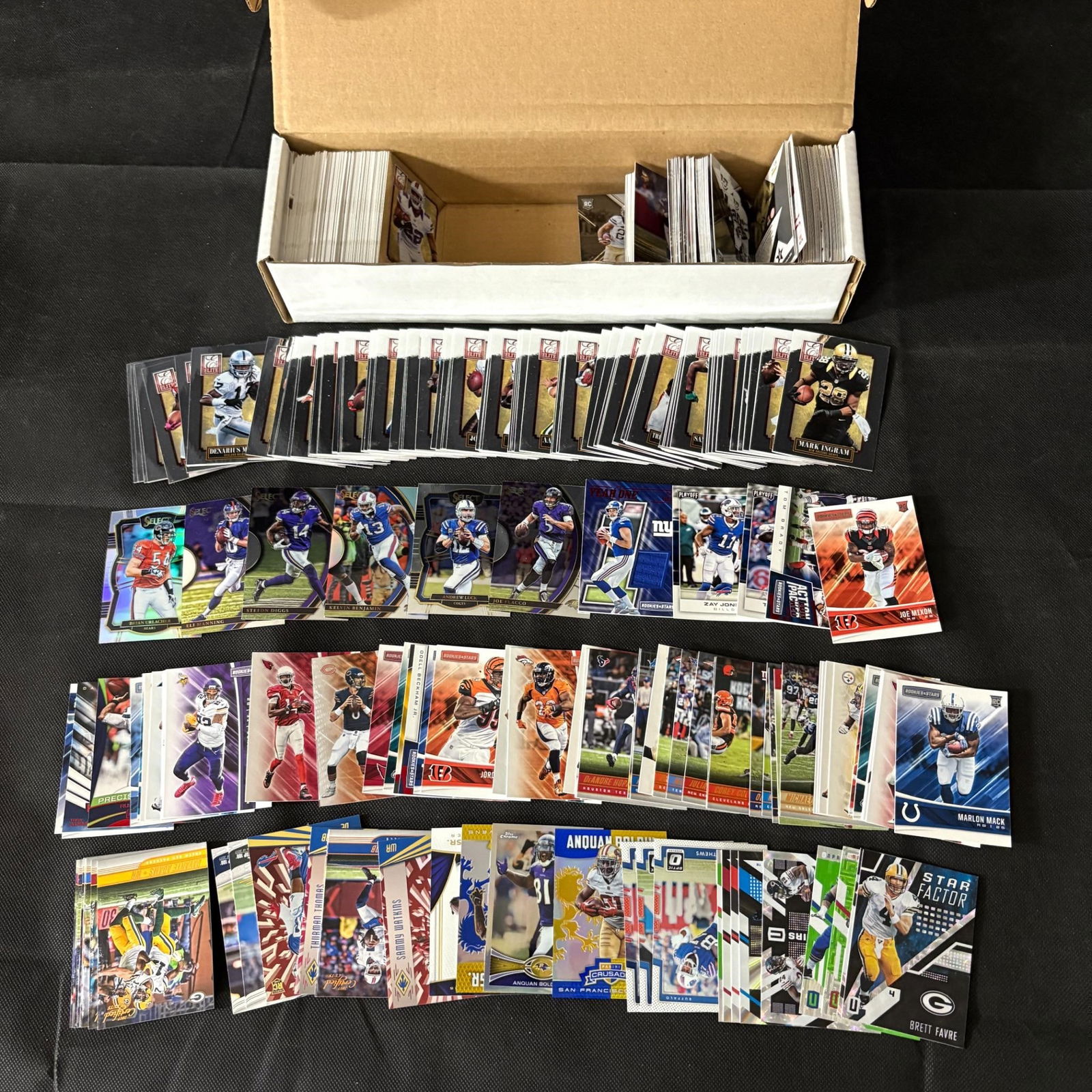 100s of Modern Football Cards, Rookies & Stars +: 100s of Modern Football cards. Includes Select, Rookies and Stars, Panini, Unparalleled, Elite, +We ship in-house! We ship internationally. We also offer pick up and we offer a discount for cash payme