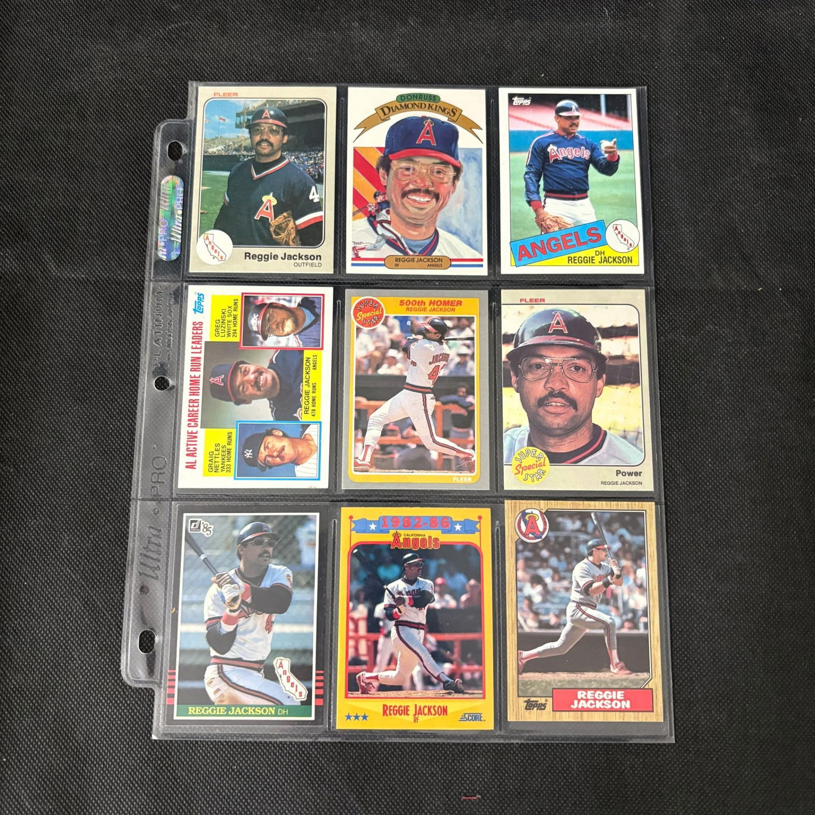 SHEET OF 9 HOF REGGIE JACKSON CARDS (1 of 2)