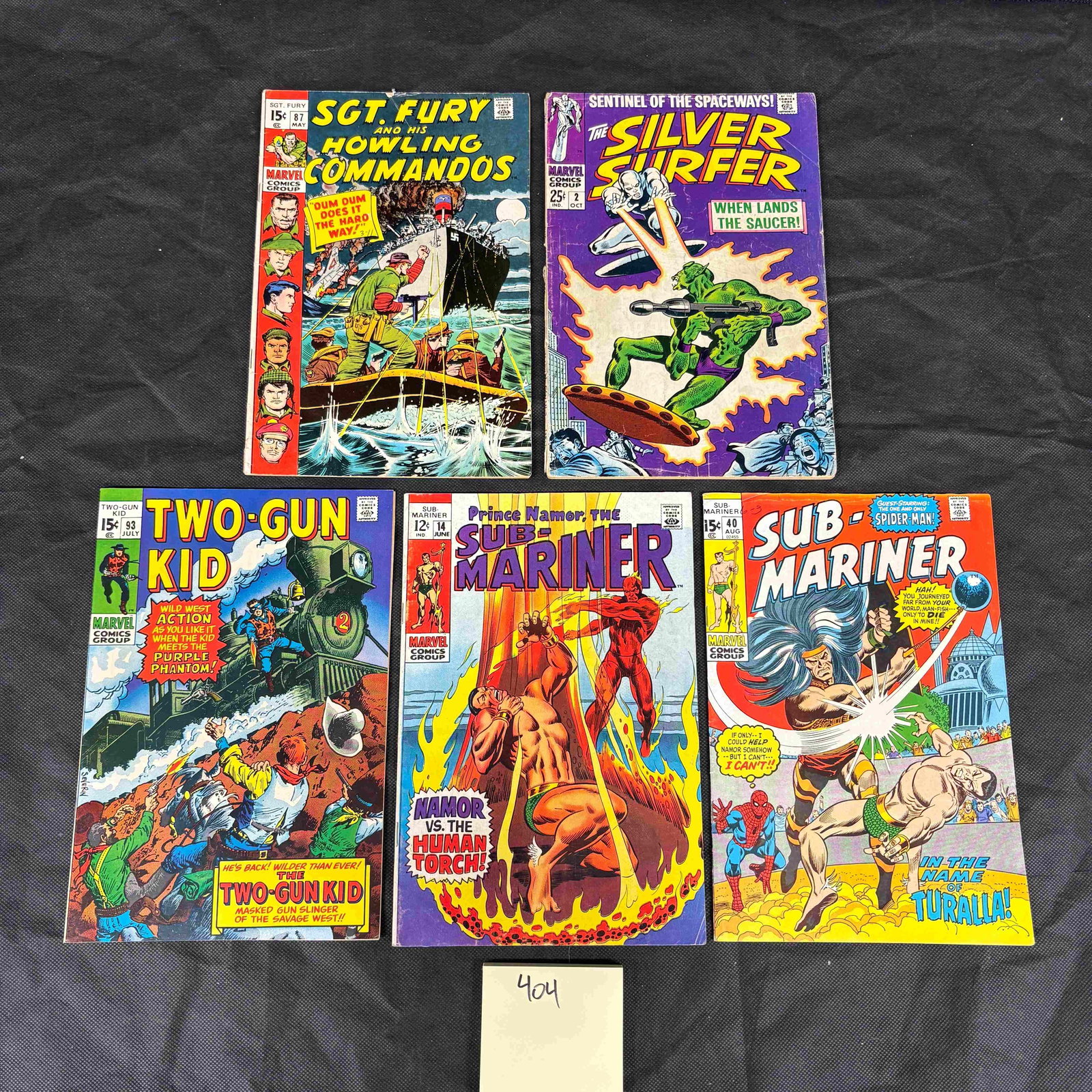 5 Marvel Comics, Featuring Sub-Mariner, Silver Surfer, Sgt. Fury, and Two-Gun Kid, Late: A collection of 5 vintage Marvel Comics from the late 1960s, featuring various characters and genres. Each comic displays the "Marvel Comics Group" logo and features full-color illustrated covers depi