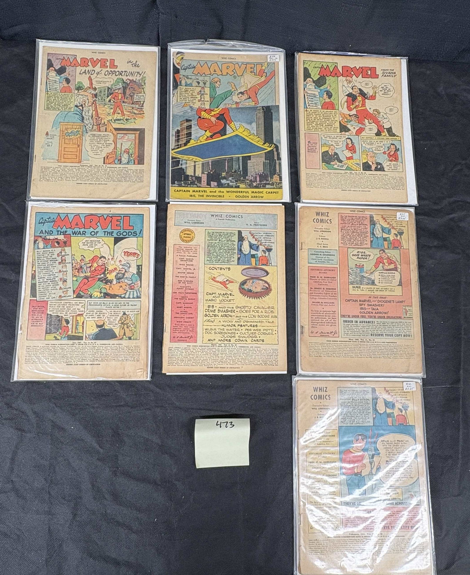 A Group of Golden Age Whiz Comics Featuring Captain Marvel by Fawcett, 1947-1948: A group of Golden Age Whiz Comics featuring Captain Marvel, published by Fawcett Comics. This collection comprises seven individually sleeved American comic books, with visible publication dates rangi