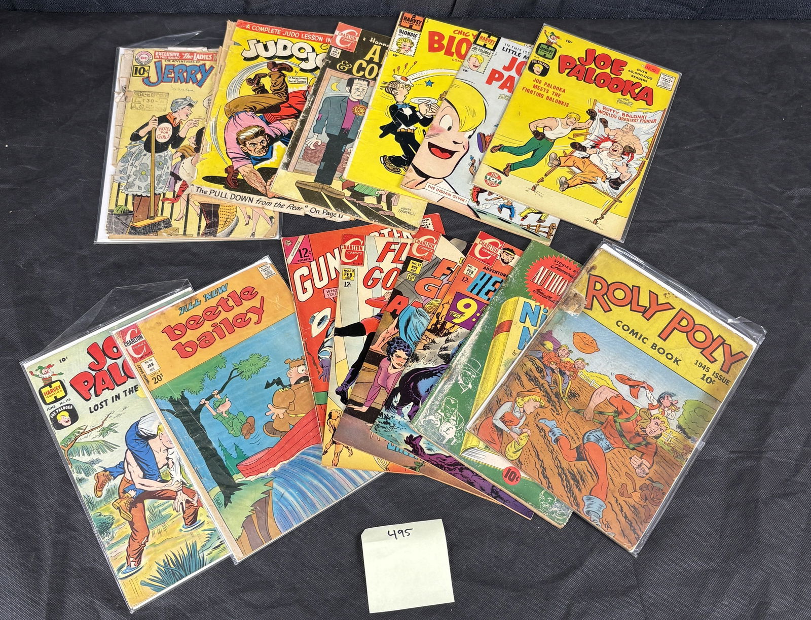 A Collection of American Golden to Silver Age Comic Books, including Jerry, Joe Palooka, and Beetle: A collection of approximately 15-20 American comic books, primarily from the mid-20th century, spanning the Golden to Silver Age periods. Featured titles include "Jerry" (DC National Comics), "Judo-Jo