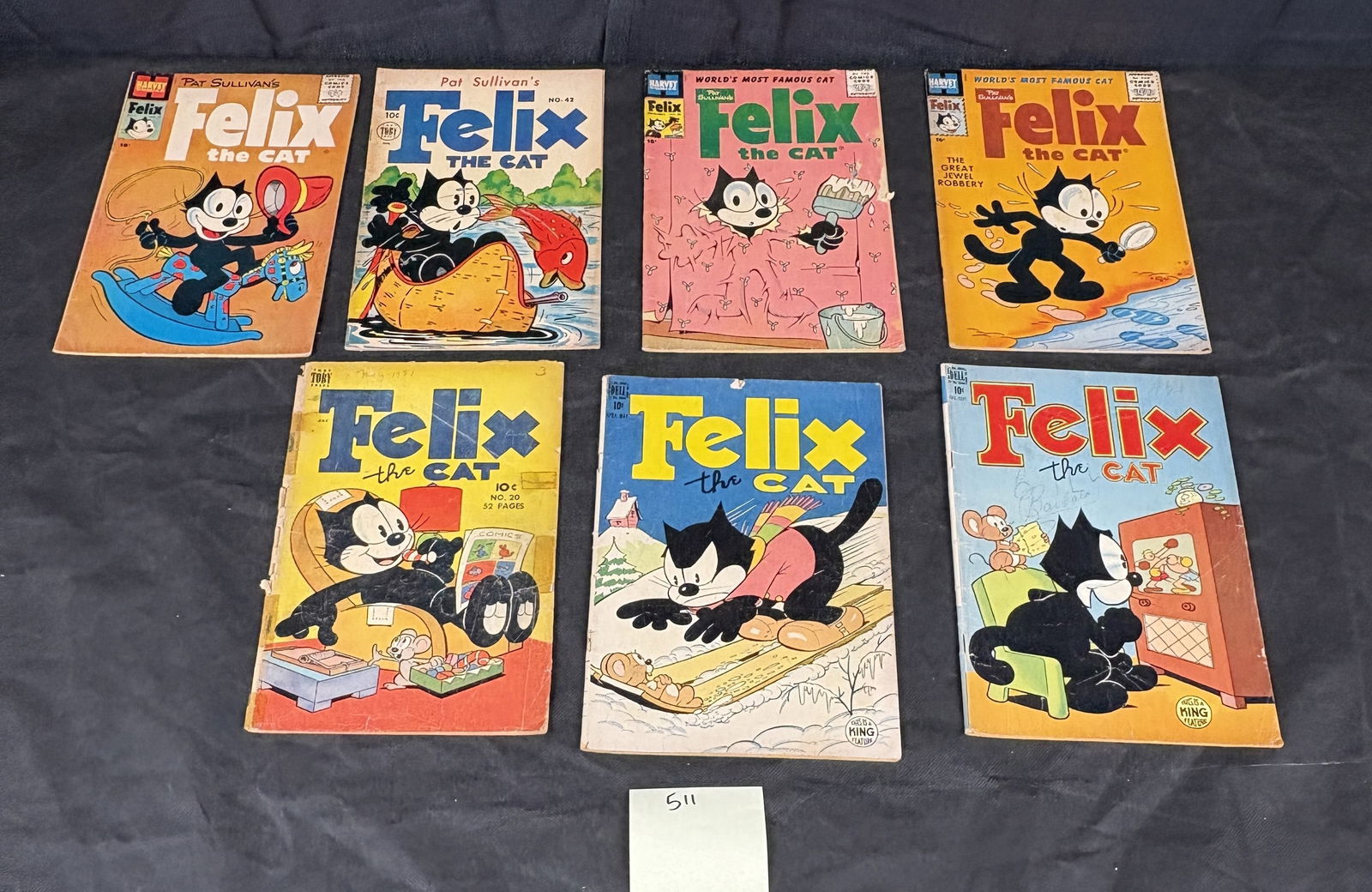 A Group of Vintage Felix the Cat Comic Books, Dell, Toby, and Harvey, circa 1949-1951: A group of seven vintage "Felix the Cat" comic books, primarily featuring the eponymous black cat character in various action poses and comedic scenarios on their colorful paper covers. Issues carry t