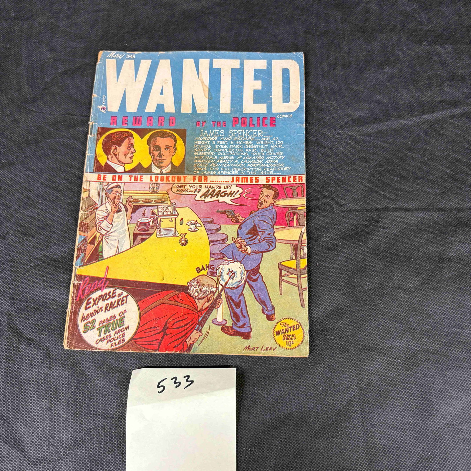 Wanted Comics #13, May 1948, Mort Leav, Heroin Drug Propaganda Cover: Wanted Comics #13, May 1948, featuring art by Mort Leav. The front cover depicts a "Wanted" poster for "JAMES SPENCER" alongside Golden Age comic illustrations of a chef, a waiter, and crime scenes in