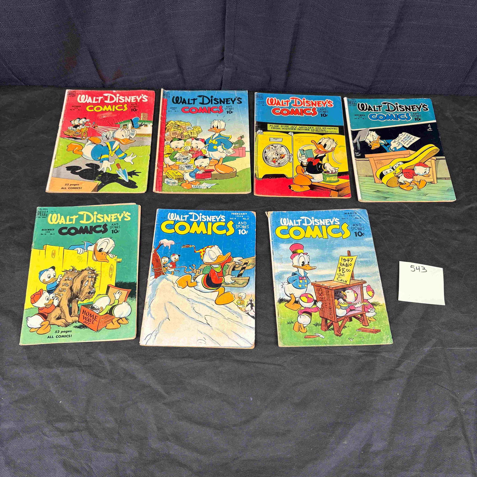 7 Walt Disney's Comics and Stories, Featuring Carl Barks' Donald Duck, Golden Age, Late: 7 vintage 'Walt Disney's Comics and Stories' comic books, primarily featuring Donald Duck and other classic Disney characters, many with stories by the influential Golden Age artist Carl Barks. Identi