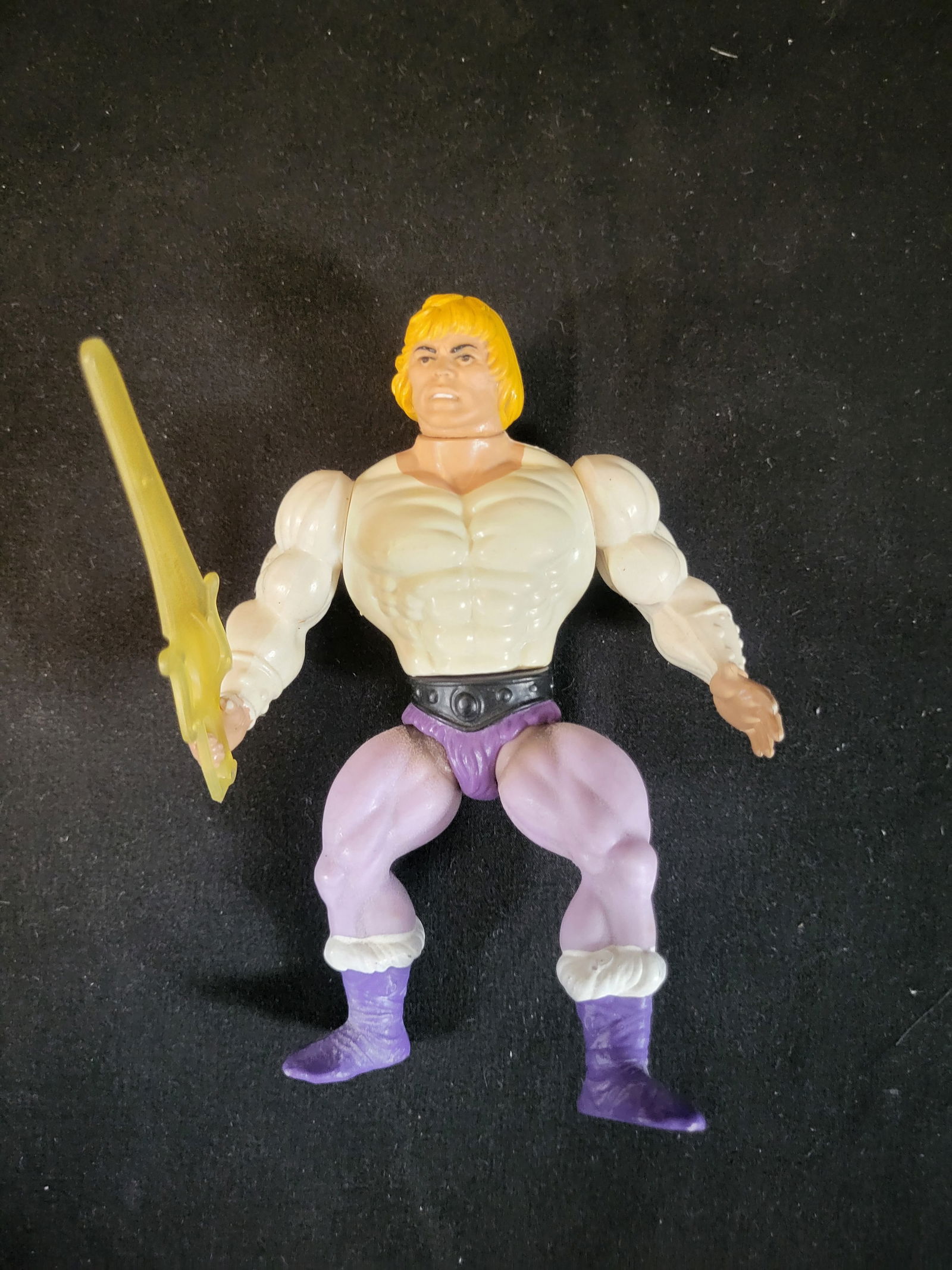 I00130 Mattel Masters of the Universe Prince Adam Action Figure: BID PER WHAT YOU SEE IN THE PHOTO, NOT THE AI GENERATED TITLES AND DESCRIPTIONS! A vintage Mattel Masters of the Universe Prince Adam action figure. The articulated figure is constructed from molded p