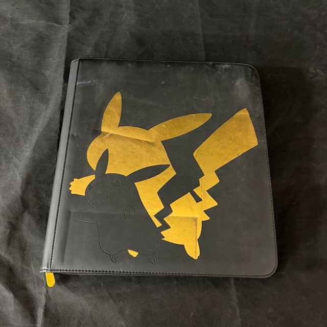 I00560 A Collection of Pokemon Trading Cards in an Ultra Pro Pikachu Elite Series Zippered (1 of 20)