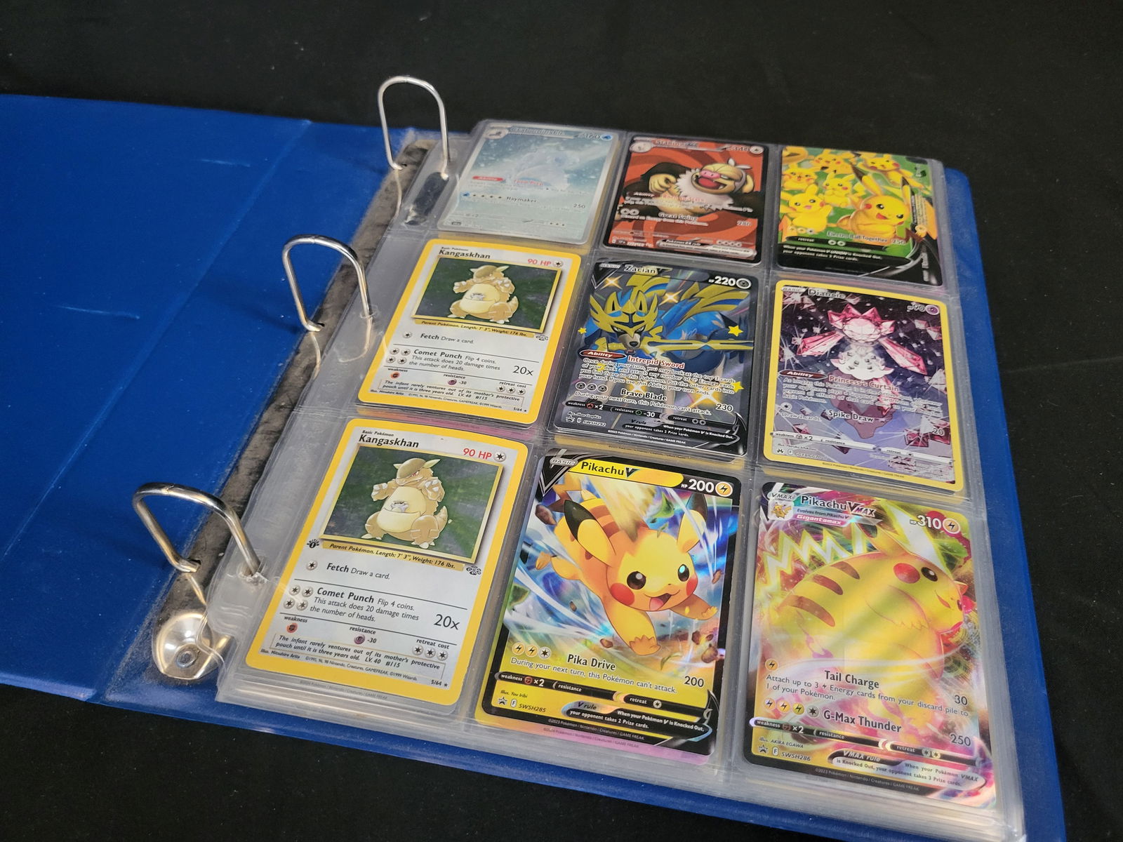 I00425 A Collection of Pok?©mon Trading Cards Featuring Pikachu and Charizard (1 of 7)