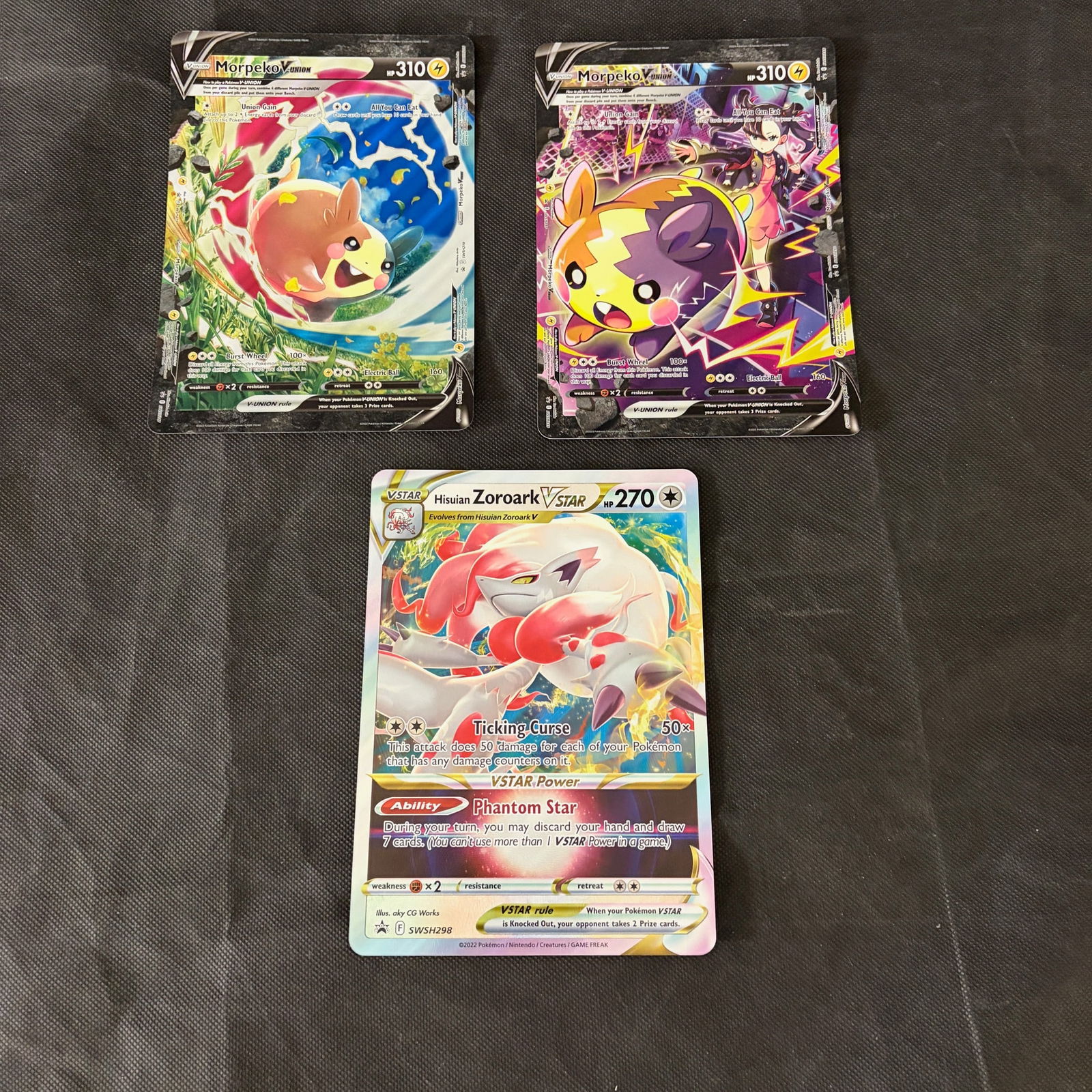 I00558 A Trio of Pokemon Trading Cards Including Hisuian Zoroark VSTAR SWSH298 Jumbo Promo (1 of 2)