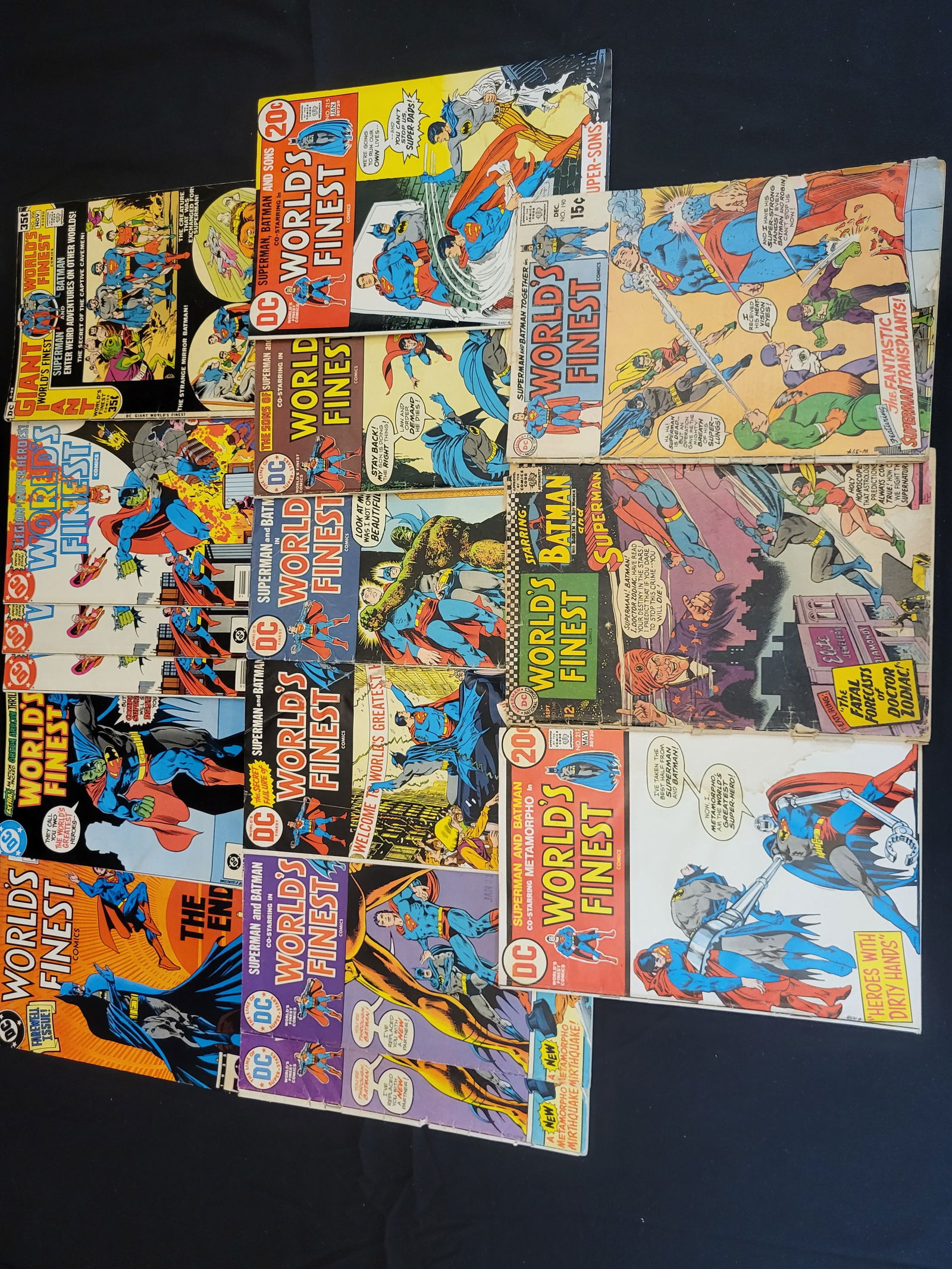 A Group of Vintage DC Comics World's Finest Comics: BID PER WHAT YOU SEE IN THE PHOTO, NOT THE AI GENERATED TITLES AND DESCRIPTIONS! A group of vintage DC Comics World's Finest Comics featuring Superman and Batman. This assortment primarily includes is