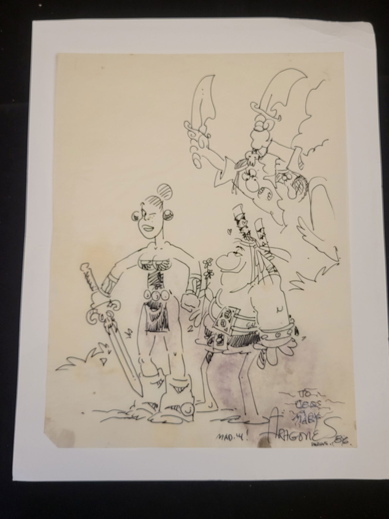 Sergio Aragones (Spanish-Mexican, b. 1937), Original Ink Illustration, 1986: BID PER WHAT YOU SEE IN THE PHOTO, NOT THE AI GENERATED TITLES AND DESCRIPTIONS! This original ink illustration on cream-colored paper is rendered in the caricature style of artist Sergio Aragones. Th