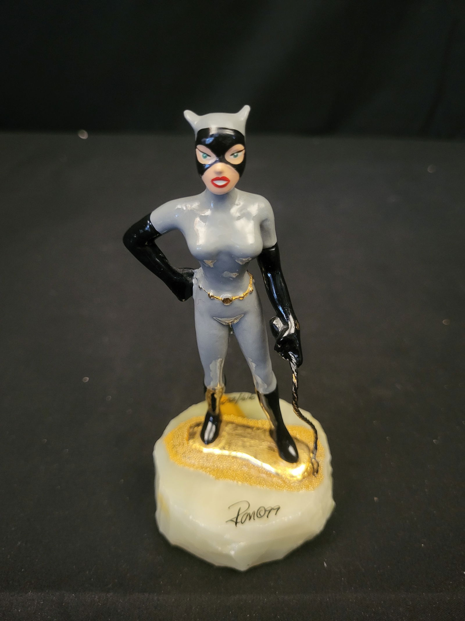 Ron Lee Limited Edition Catwoman Hand-Painted Pewter Figurine: BID PER WHAT YOU SEE IN THE PHOTO, NOT THE AI GENERATED TITLES AND DESCRIPTIONS! This limited-edition hand-painted pewter figurine by artist Ron Lee depicts the DC Comics character Catwoman in the sty