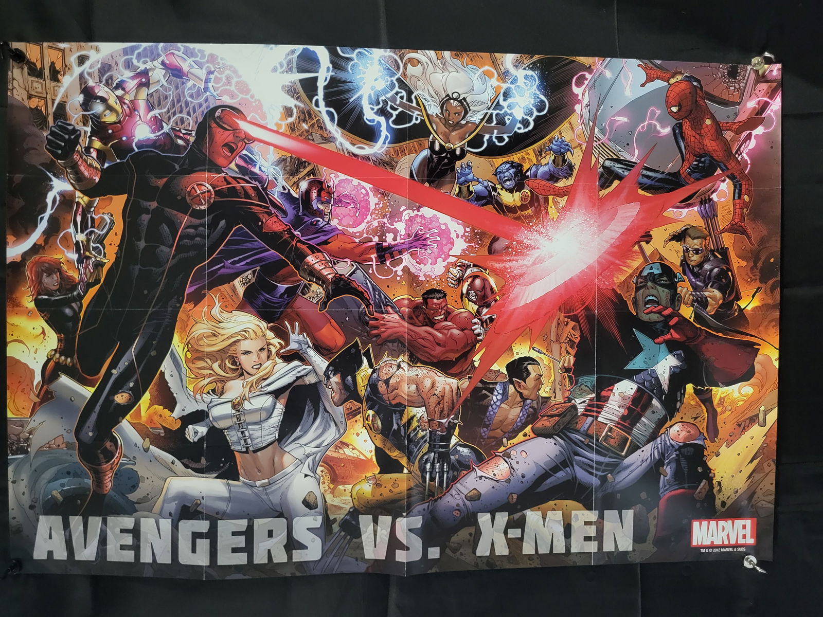 Marvel Avengers vs. X-Men Promotional Poster, 2012: BID PER WHAT YOU SEE IN THE PHOTO, NOT THE AI GENERATED TITLES AND DESCRIPTIONS! A large-scale promotional paper poster for the Marvel comic book event Avengers vs. X-Men. The illustration features a