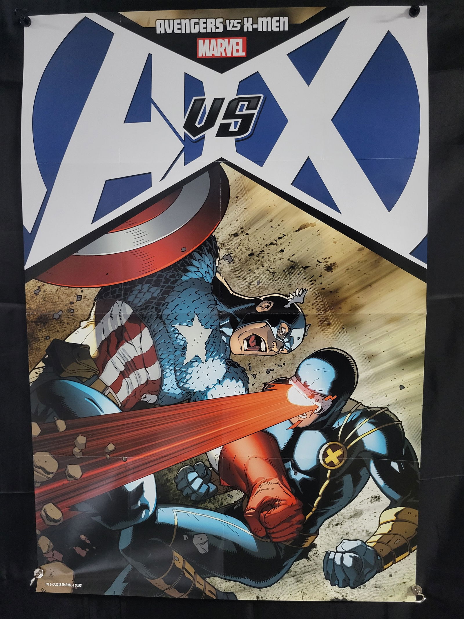 Marvel Avengers vs. X-Men Promotional Poster, 2012: BID PER WHAT YOU SEE IN THE PHOTO, NOT THE AI GENERATED TITLES AND DESCRIPTIONS! A 2012 Marvel promotional poster for the Avengers vs. X-Men comic book crossover event. The illustration depicts Captai