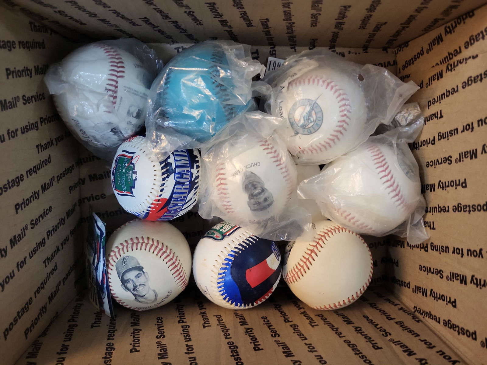 I00998 | Collection of 9 MLB Commemorative and Promotional Baseballs, Florida Marlins and 1999 All-S: BID PER WHAT YOU SEE IN THE PHOTO, NOT THE AI GENERATED TITLES AND DESCRIPTIONS! Collection of 9 MLB Commemorative and Promotional Baseballs, Florida Marlins and 1999 All-Star Game This collection fea