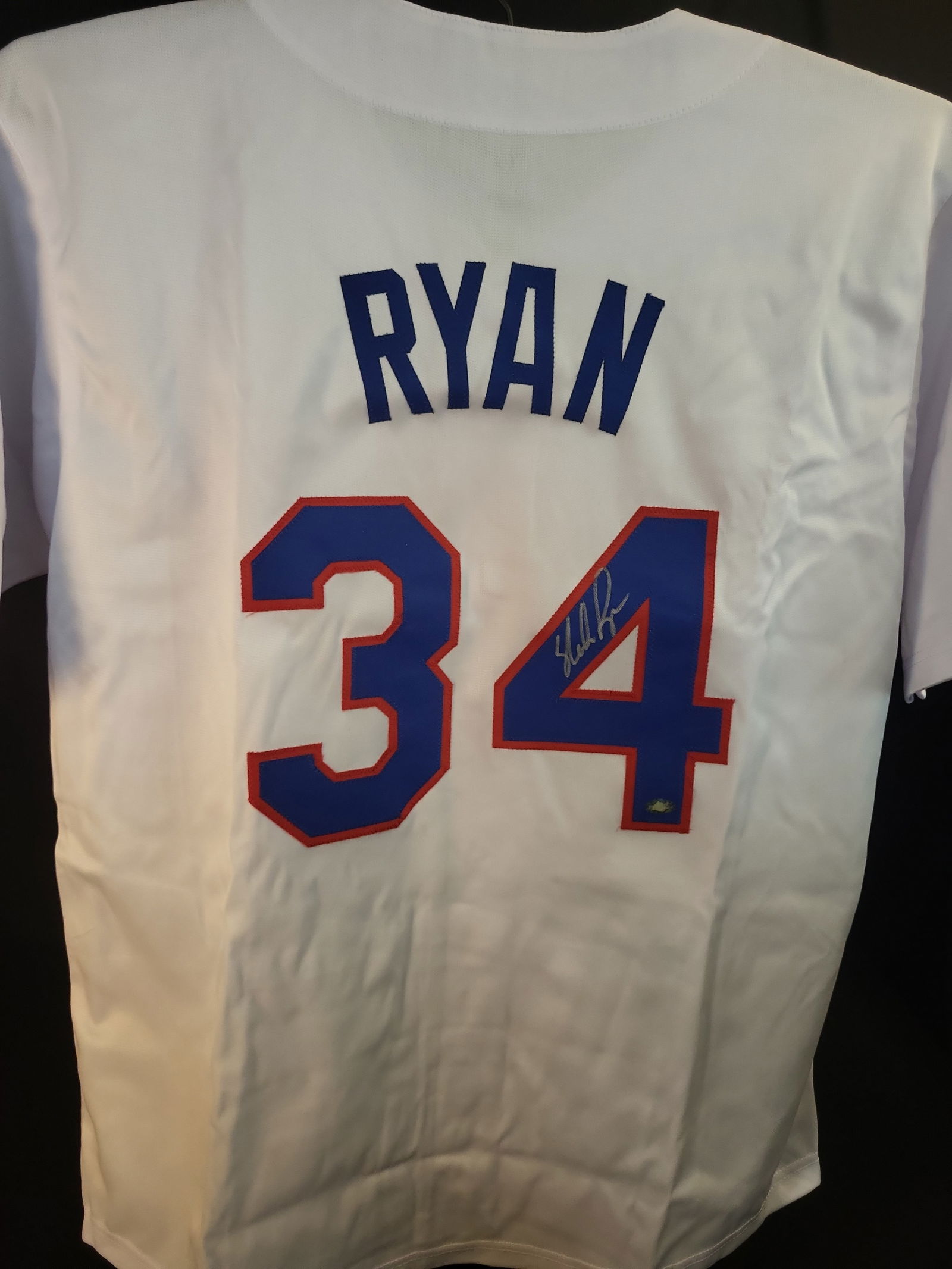 I01019 | Nolan Ryan Autographed Texas Rangers Jersey with Nolan Ryan's Personal Authentication: BID PER WHAT YOU SEE IN THE PHOTO, NOT THE AI GENERATED TITLES AND DESCRIPTIONS! Nolan Ryan Autographed Texas Rangers Jersey with Nolan Ryan's Personal Authentication This professional auction offerin