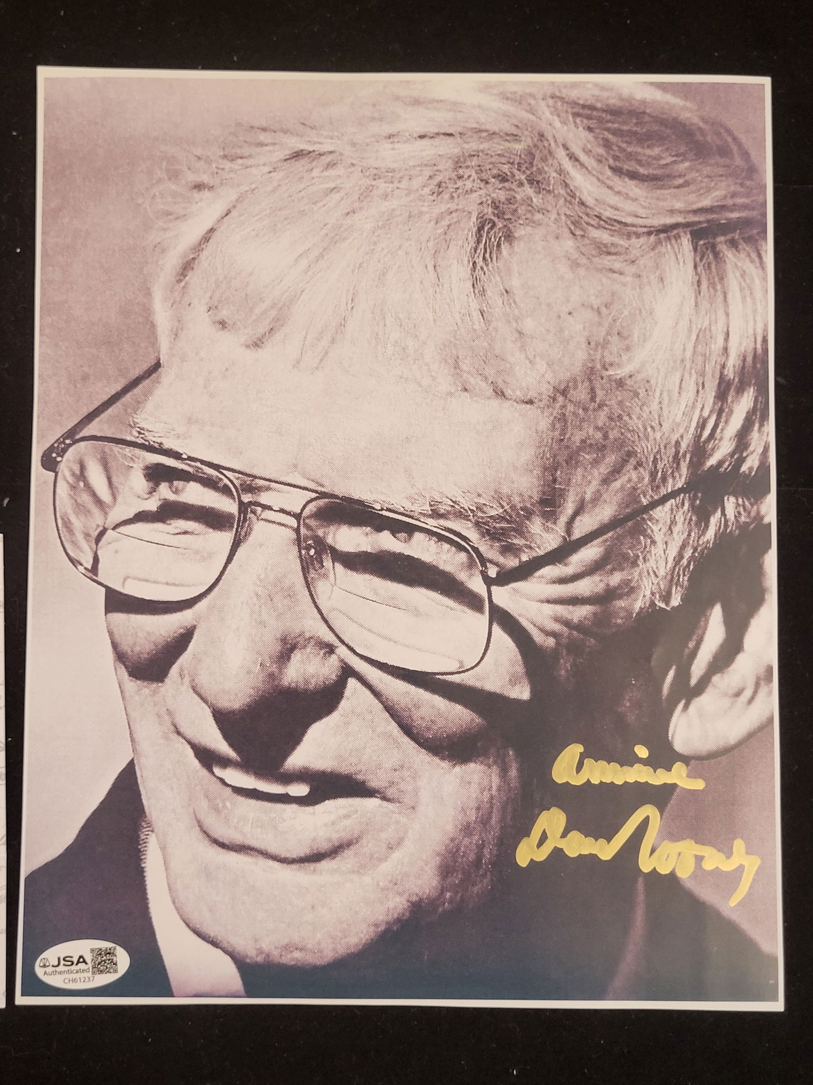 I00740 | Lou Holtz Autographed Monochromatic Portrait Photograph with JSA Authentication: BID PER WHAT YOU SEE IN THE PHOTO, NOT THE AI GENERATED TITLES AND DESCRIPTIONS! Lou Holtz Autographed Monochromatic Portrait Photograph with JSA Authentication A monochromatic close-up portrait photo