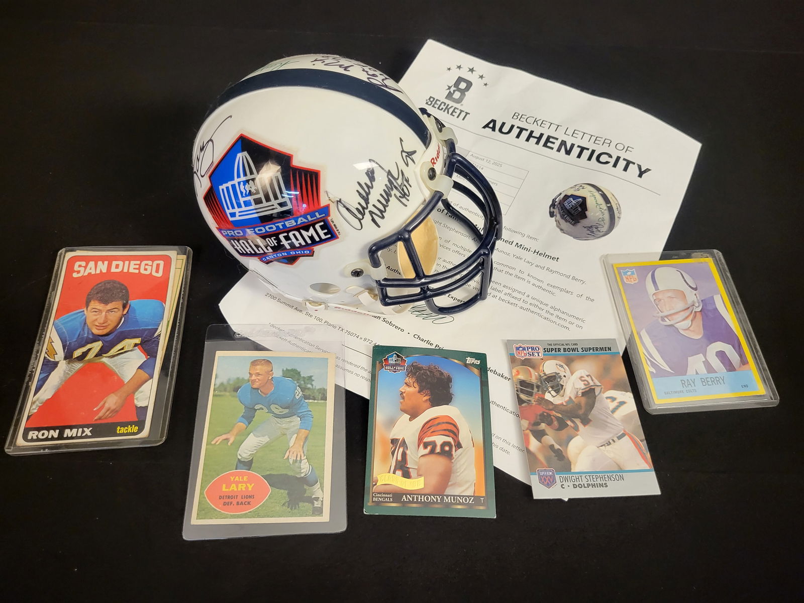 I00564 | A Collection of NFL Hall of Fame Autographed Memorabilia Including a Multi-Signed Mini Helm: BID PER WHAT YOU SEE IN THE PHOTO, NOT THE AI GENERATED TITLES AND DESCRIPTIONS! A Collection of NFL Hall of Fame Autographed Memorabilia Including a Multi-Signed Mini Helmet Beckett This collection f