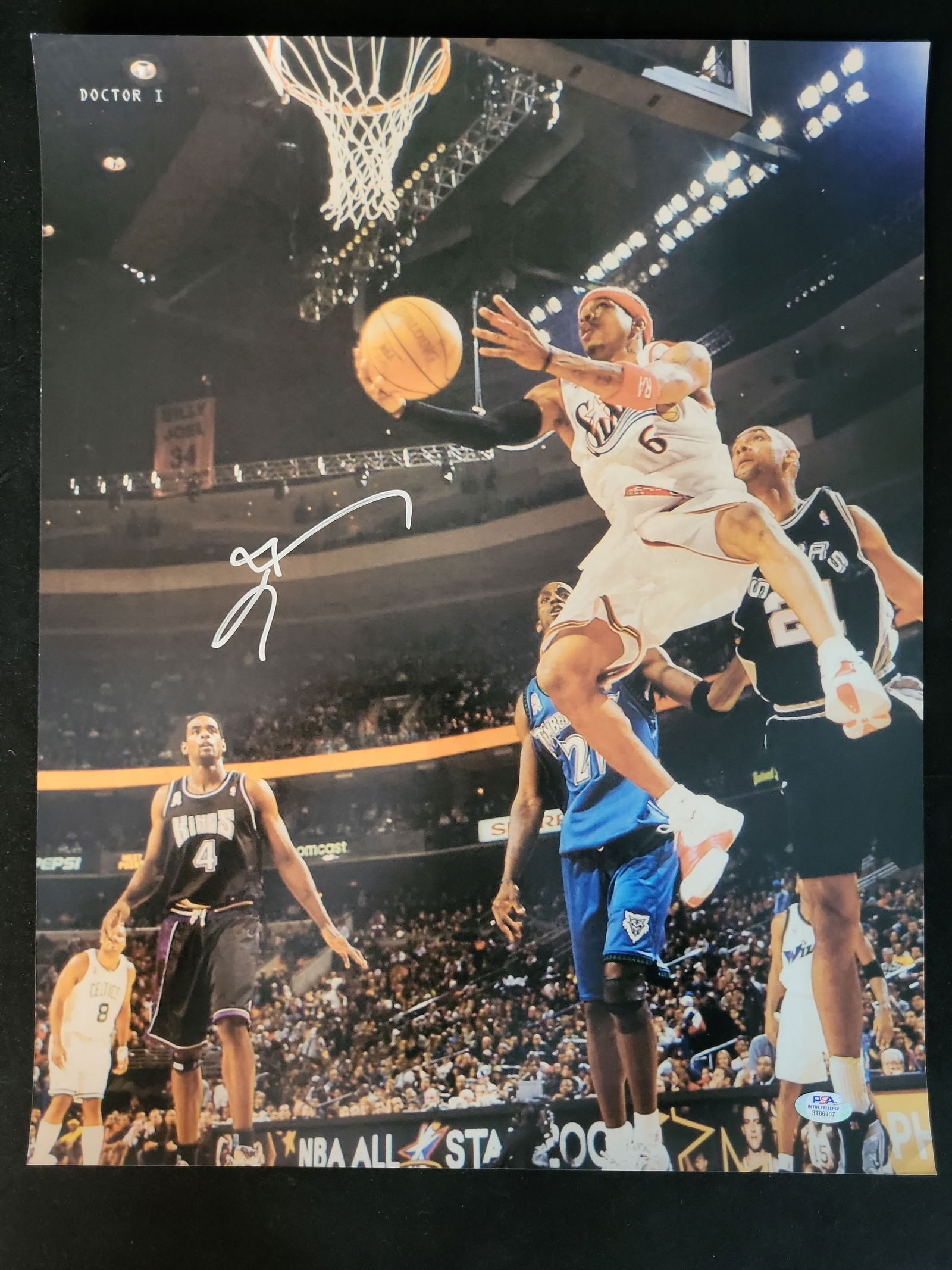 I00975 | Allen Iverson Autographed 2001 NBA All-Star Game Photograph, PSA/DNA Certified: BID PER WHAT YOU SEE IN THE PHOTO, NOT THE AI GENERATED TITLES AND DESCRIPTIONS! Allen Iverson Autographed 2001 NBA All-Star Game Photograph, PSA/DNA CertifiedThis lot features an iconic action photog