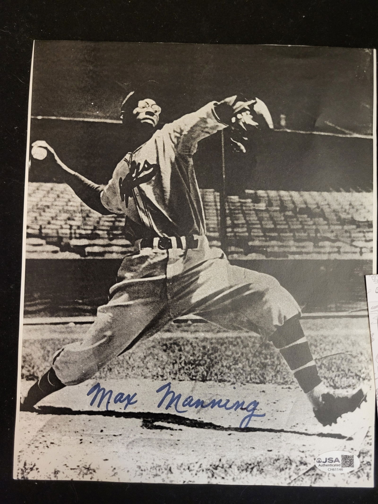 I00680 | Max Manning Autographed Newark Eagles Negro League Baseball Photograph JSA: BID PER WHAT YOU SEE IN THE PHOTO, NOT THE AI GENERATED TITLES AND DESCRIPTIONS! Max Manning Autographed Newark Eagles Negro League Baseball Photograph JSA An autographed black and white photograph of