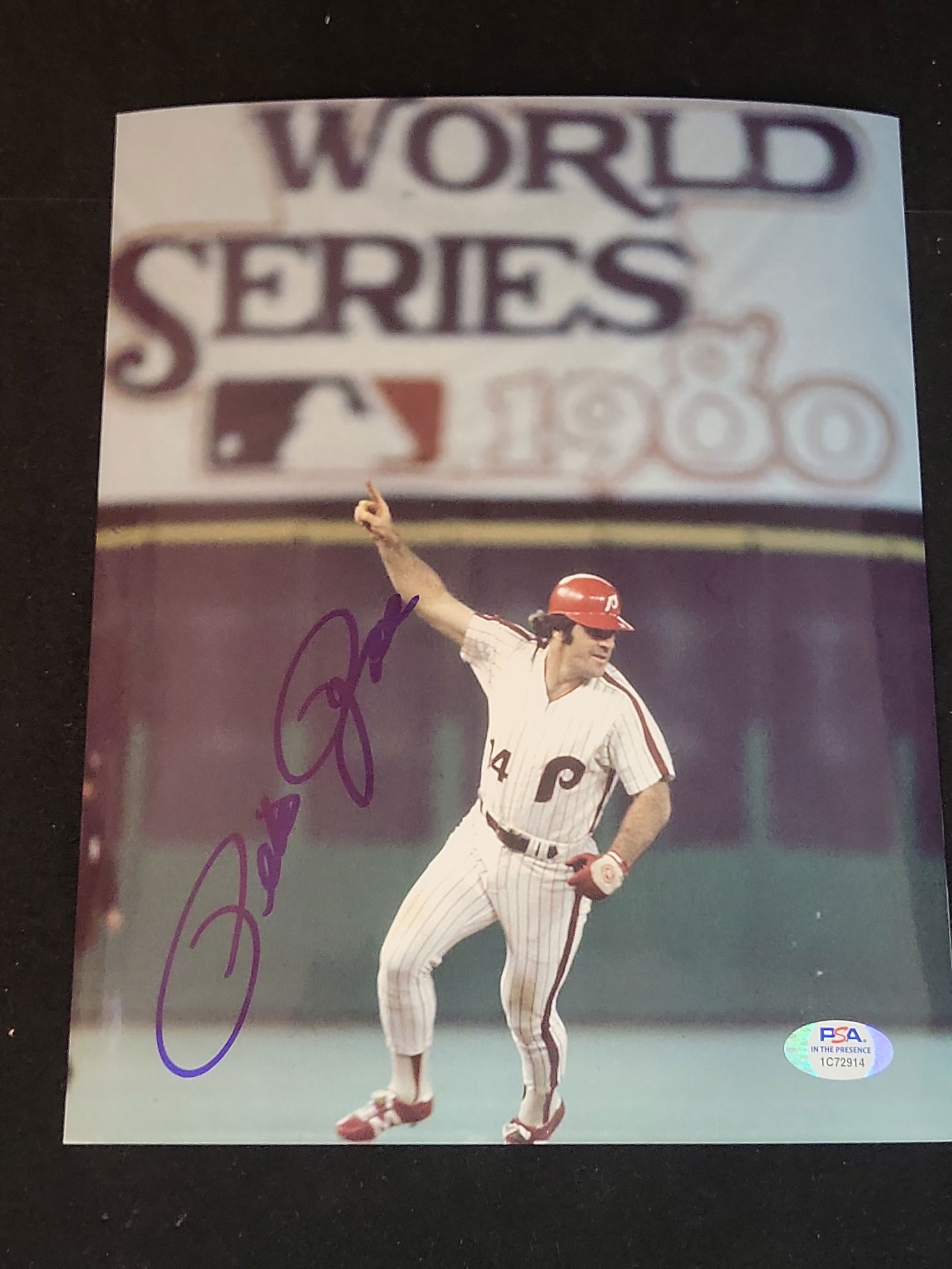 I00960 | Pete Rose Autographed 1980 World Series Philadelphia Phillies Photograph, PSA/DNA In The Pr: BID PER WHAT YOU SEE IN THE PHOTO, NOT THE AI GENERATED TITLES AND DESCRIPTIONS! Pete Rose Autographed 1980 World Series Philadelphia Phillies Photograph, PSA/DNA In The Presence This professional col