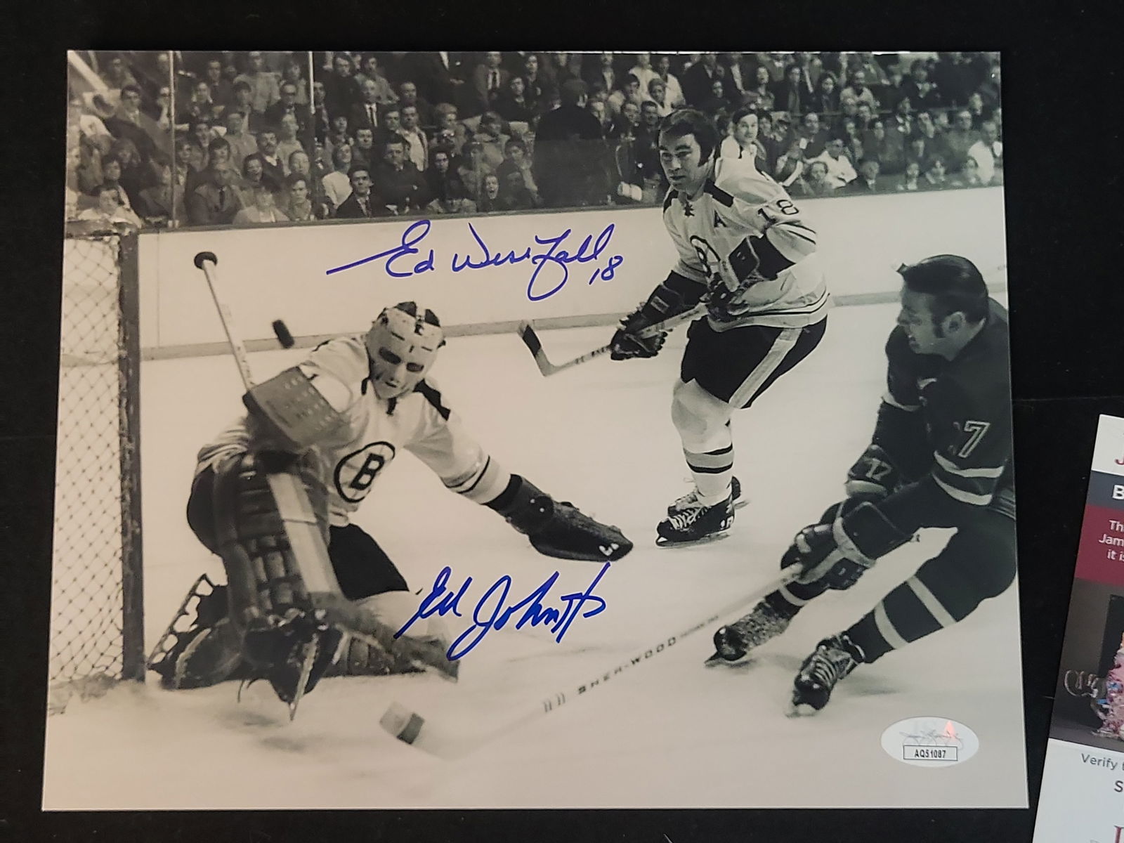 I00954 | Ed Westfall and Eddie Johnston Signed Boston Bruins Photograph, JSA Authenticated: BID PER WHAT YOU SEE IN THE PHOTO, NOT THE AI GENERATED TITLES AND DESCRIPTIONS! Ed Westfall and Eddie Johnston Signed Boston Bruins Photograph, JSA AuthenticatedThis vintage black-and-white action ph
