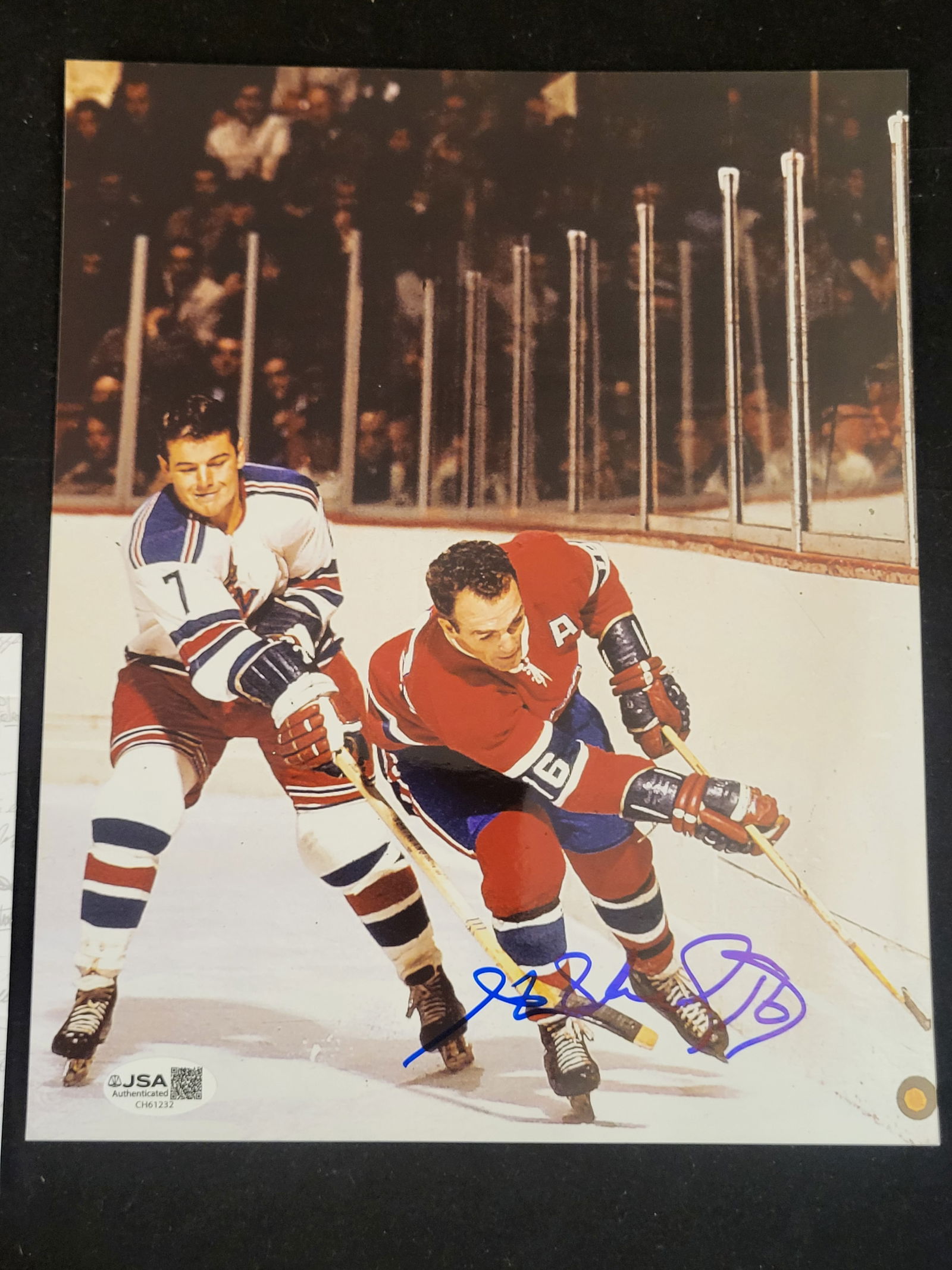 I00800 | Rod Gilbert Autographed Maurice Richard vs. Rod Gilbert Photograph, JSA Authenticated: BID PER WHAT YOU SEE IN THE PHOTO, NOT THE AI GENERATED TITLES AND DESCRIPTIONS! Rod Gilbert Autographed Maurice Richard vs. Rod Gilbert Photograph, JSA Authenticated This professional auction listing