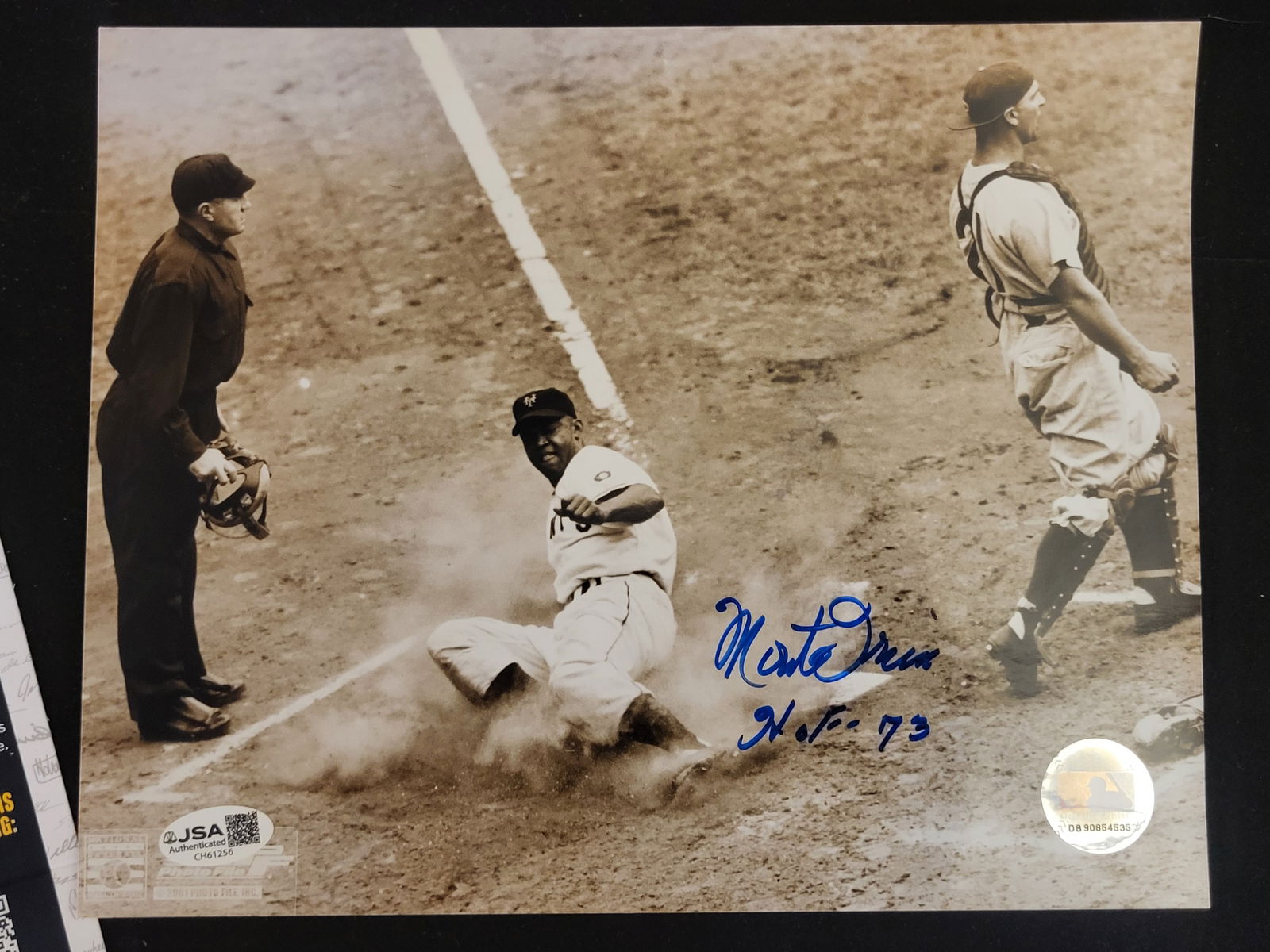 I00804 | Monte Irvin Signed 8x10 New York Giants Action Photograph JSA and MLB Authenticated: BID PER WHAT YOU SEE IN THE PHOTO, NOT THE AI GENERATED TITLES AND DESCRIPTIONS! Monte Irvin Signed 8x10 New York Giants Action Photograph JSA and MLB Authenticated This is a professionally authentica