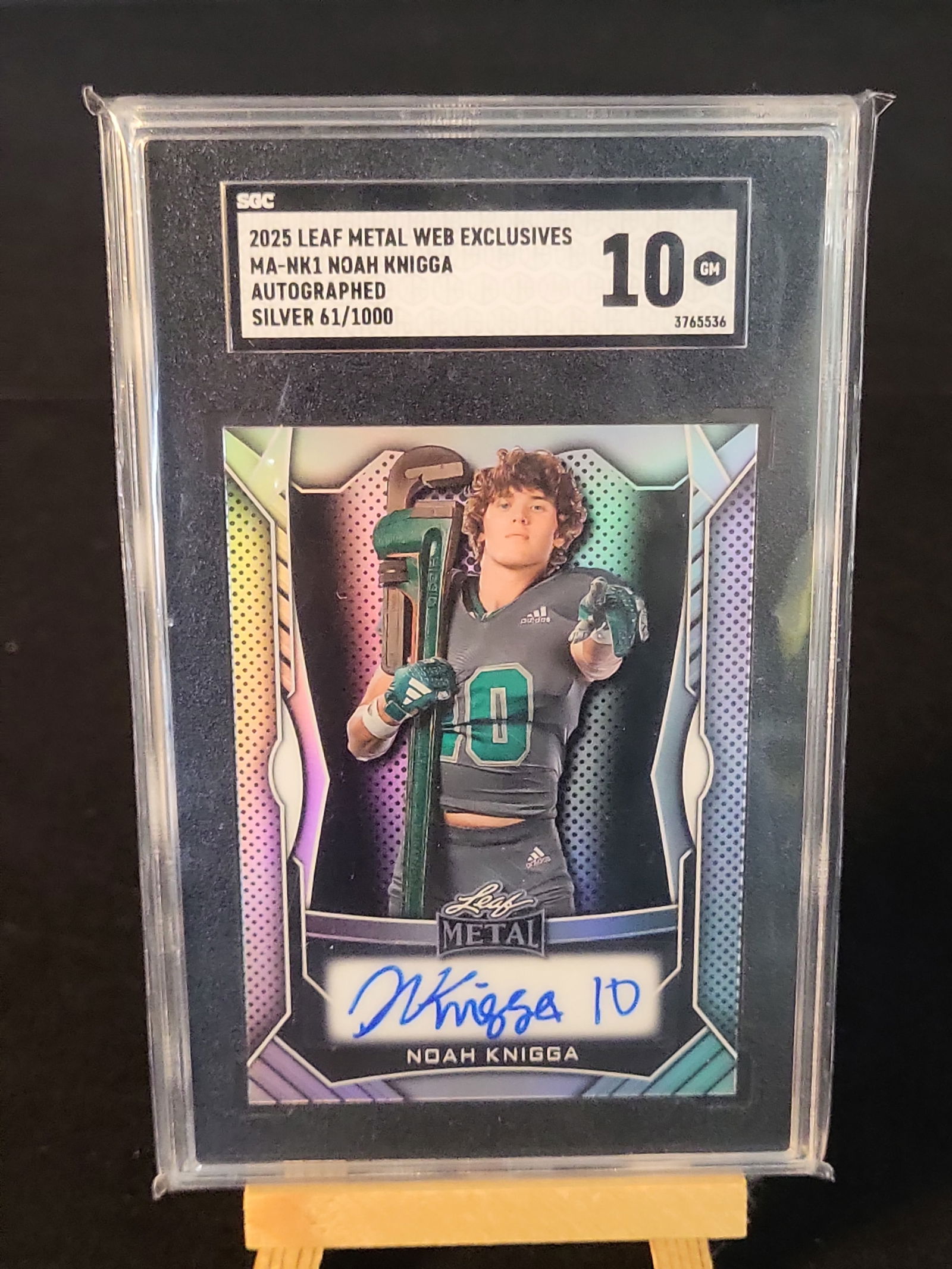 I00987 | 2025 Leaf Metal Web Exclusives Noah Knigga Autograph Silver #MA-NK1 SGC 10 GM: BID PER WHAT YOU SEE IN THE PHOTO, NOT THE AI GENERATED TITLES AND DESCRIPTIONS! 2025 Leaf Metal Web Exclusives Noah Knigga Autograph Silver #MA-NK1 SGC 10 GM This is a 2025 Leaf Metal Web Exclusives