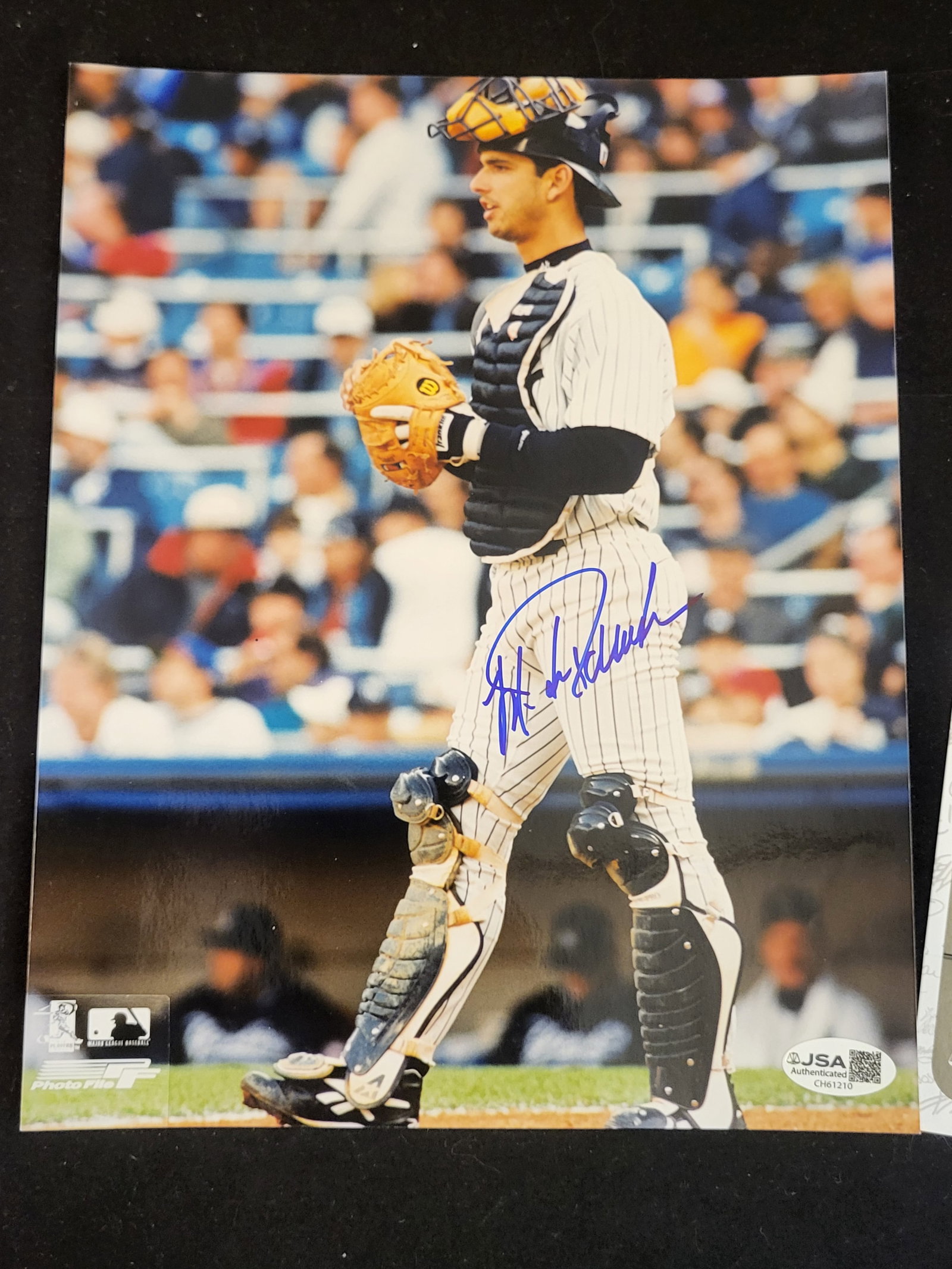 I00752 | Jorge Posada Autographed New York Yankees Color Photograph with JSA Certification: BID PER WHAT YOU SEE IN THE PHOTO, NOT THE AI GENERATED TITLES AND DESCRIPTIONS! Jorge Posada Autographed New York Yankees Color Photograph with JSA Certification This lot features an autographed colo