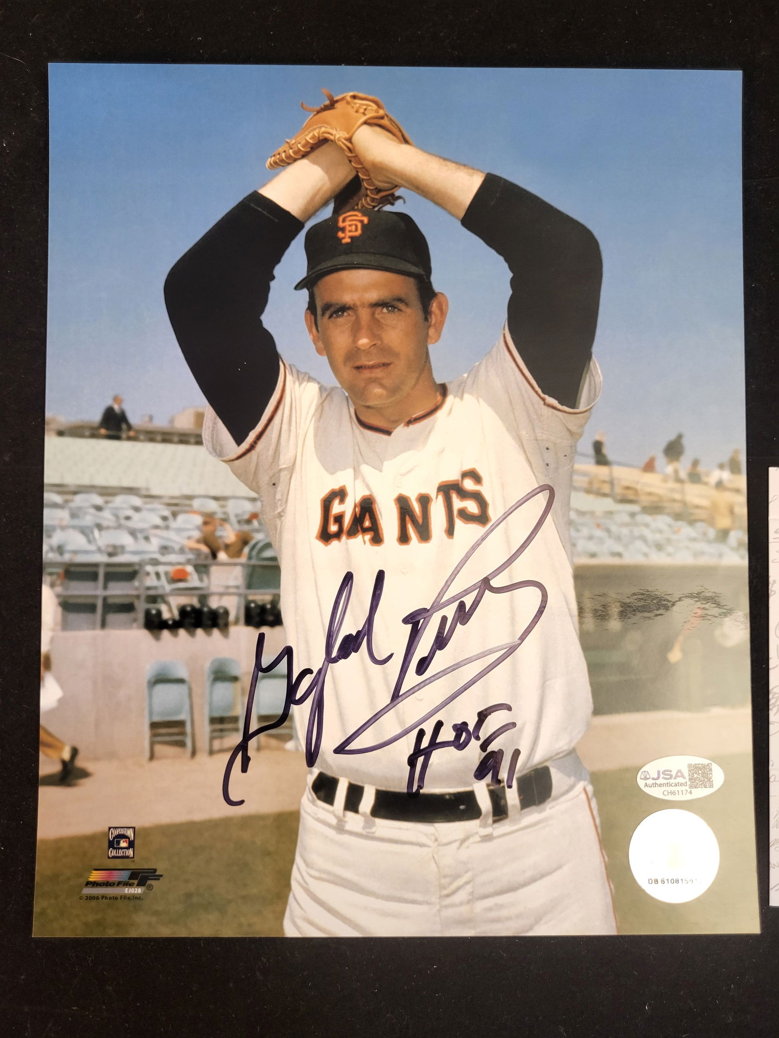 I00703 | Juan Marichal Signed San Francisco Giants Action Photograph: BID PER WHAT YOU SEE IN THE PHOTO, NOT THE AI GENERATED TITLES AND DESCRIPTIONS! Juan Marichal Signed San Francisco Giants Action PhotographColor photograph of Hall of Fame pitcher Juan Marichal in a