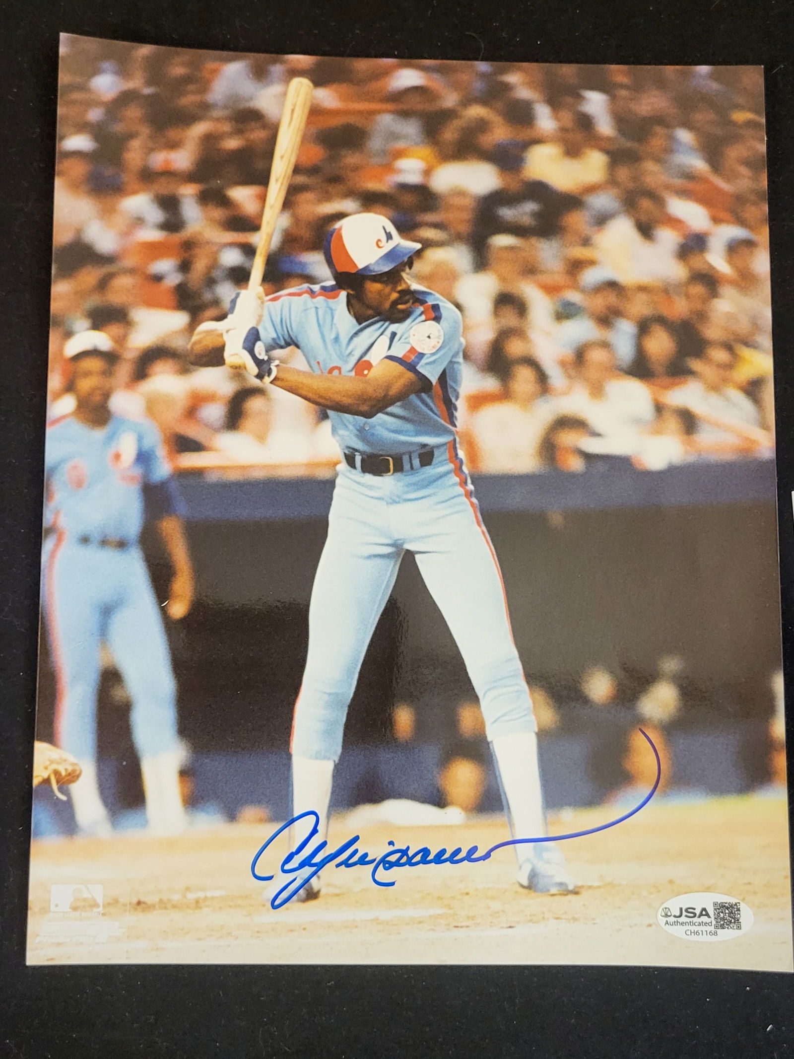 I00718 | Andre Dawson Signed Montreal Expos Action 8x10 Photo: BID PER WHAT YOU SEE IN THE PHOTO, NOT THE AI GENERATED TITLES AND DESCRIPTIONS! Andre Dawson Signed Montreal Expos Action 8x10 PhotoThis lot features an autographed color photograph of Hall of Fame b