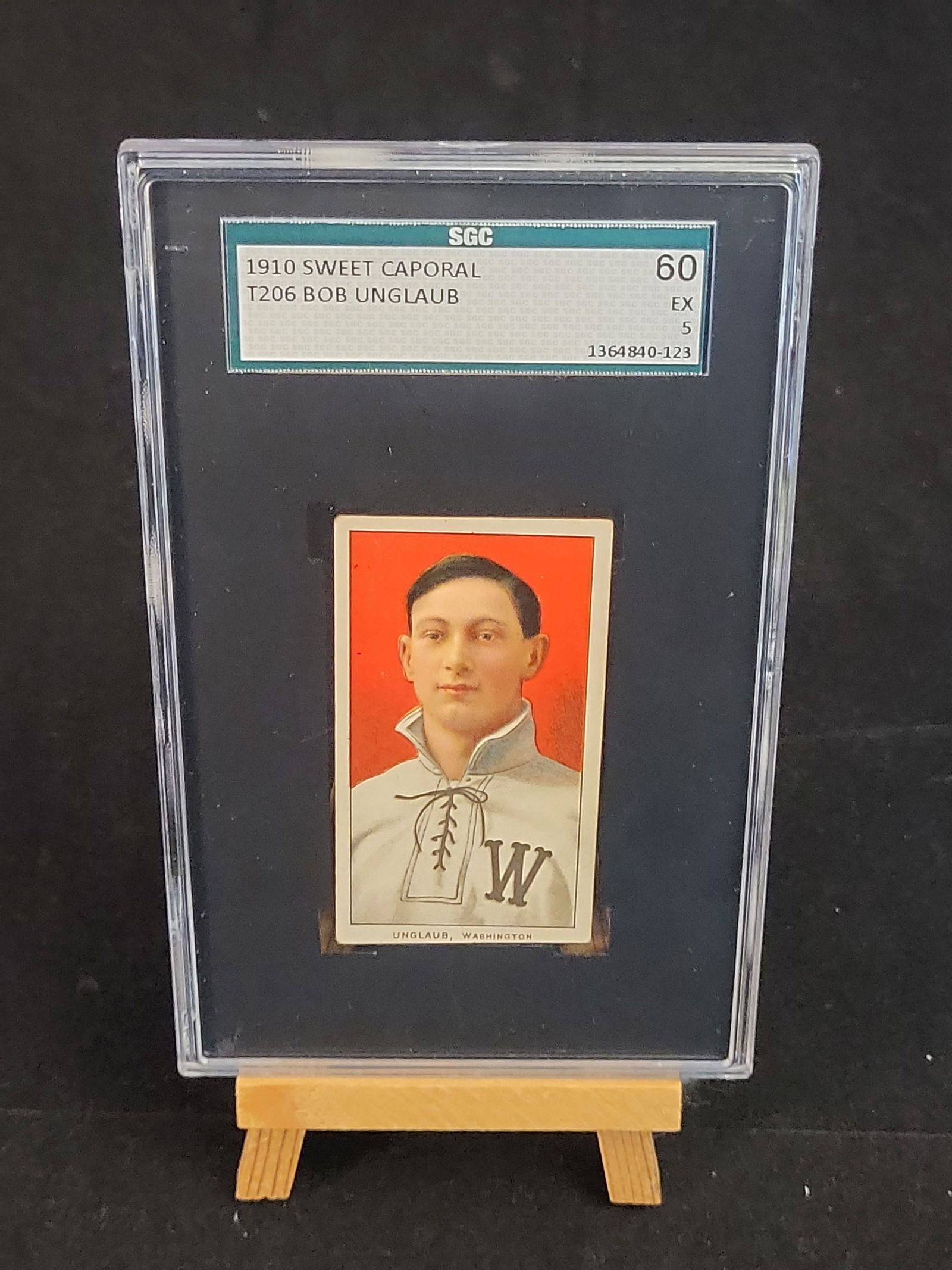 I00858 | 1910 T206 Sweet Caporal Bob Unglaub Portrait SGC 60 EX 5: BID PER WHAT YOU SEE IN THE PHOTO, NOT THE AI GENERATED TITLES AND DESCRIPTIONS! 1910 T206 Sweet Caporal Bob Unglaub Portrait SGC 60 EX 5 This is a 1909-1911 T206 White Border baseball card featuring
