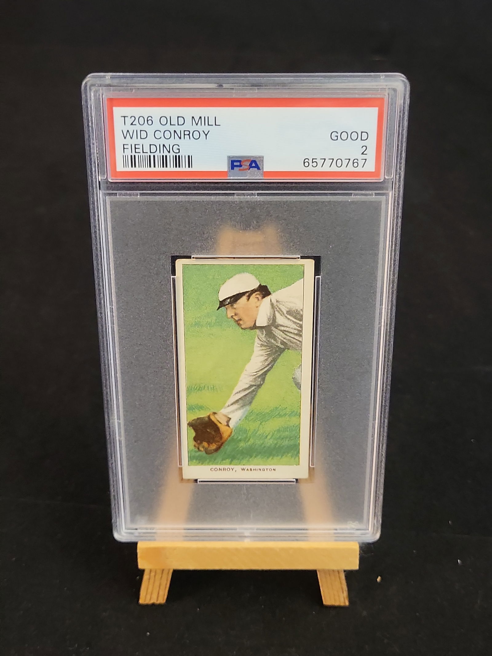 I00869 | Baseball 1909-11 T206 Wid Conroy Fielding Old Mill Back PSA 2: BID PER WHAT YOU SEE IN THE PHOTO, NOT THE AI GENERATED TITLES AND DESCRIPTIONS! Baseball 1909-11 T206 Wid Conroy Fielding Old Mill Back PSA 2 This is an authentic 1909-1911 T206 "White Border" tobacc