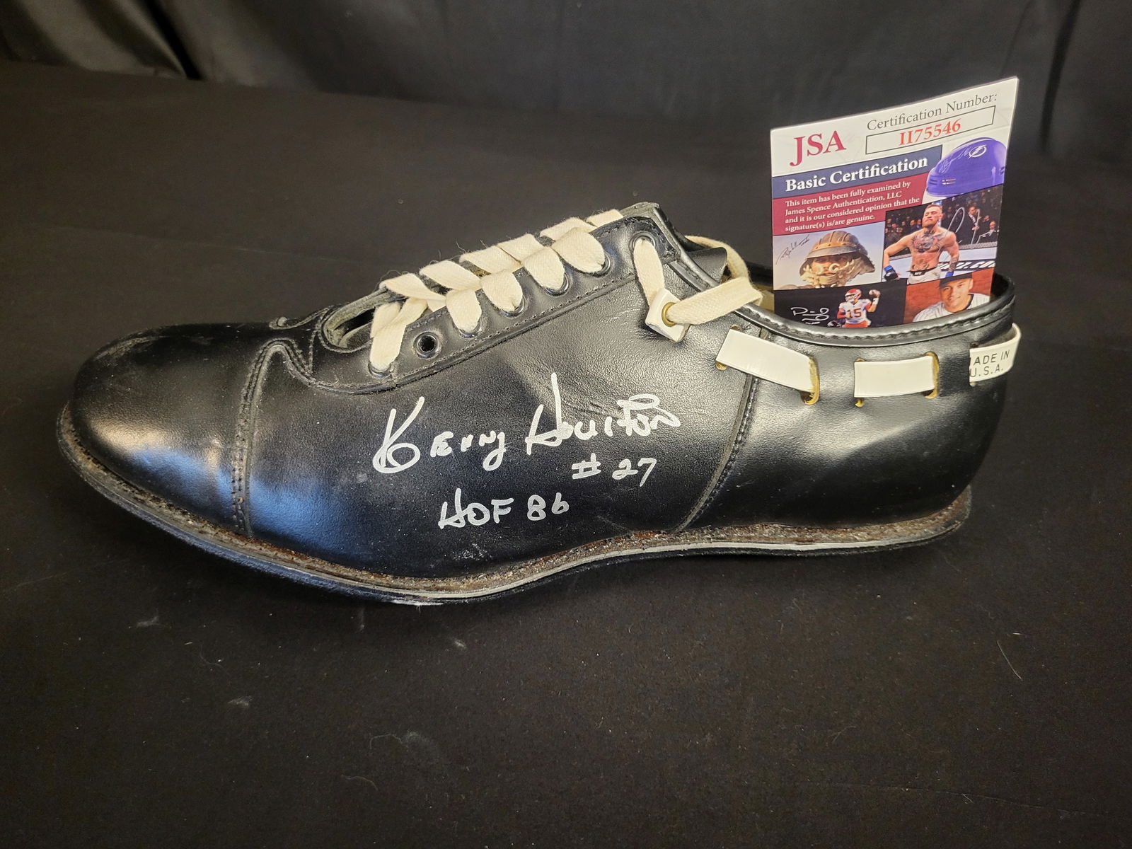 I00573 | Ken Houston Autographed Riddell Vintage Style Leather Football Cleat with JSA Authenticatio: BID PER WHAT YOU SEE IN THE PHOTO, NOT THE AI GENERATED TITLES AND DESCRIPTIONS! Ken Houston Autographed Riddell Vintage Style Leather Football Cleat with JSA Authentication A vintage-style black leat