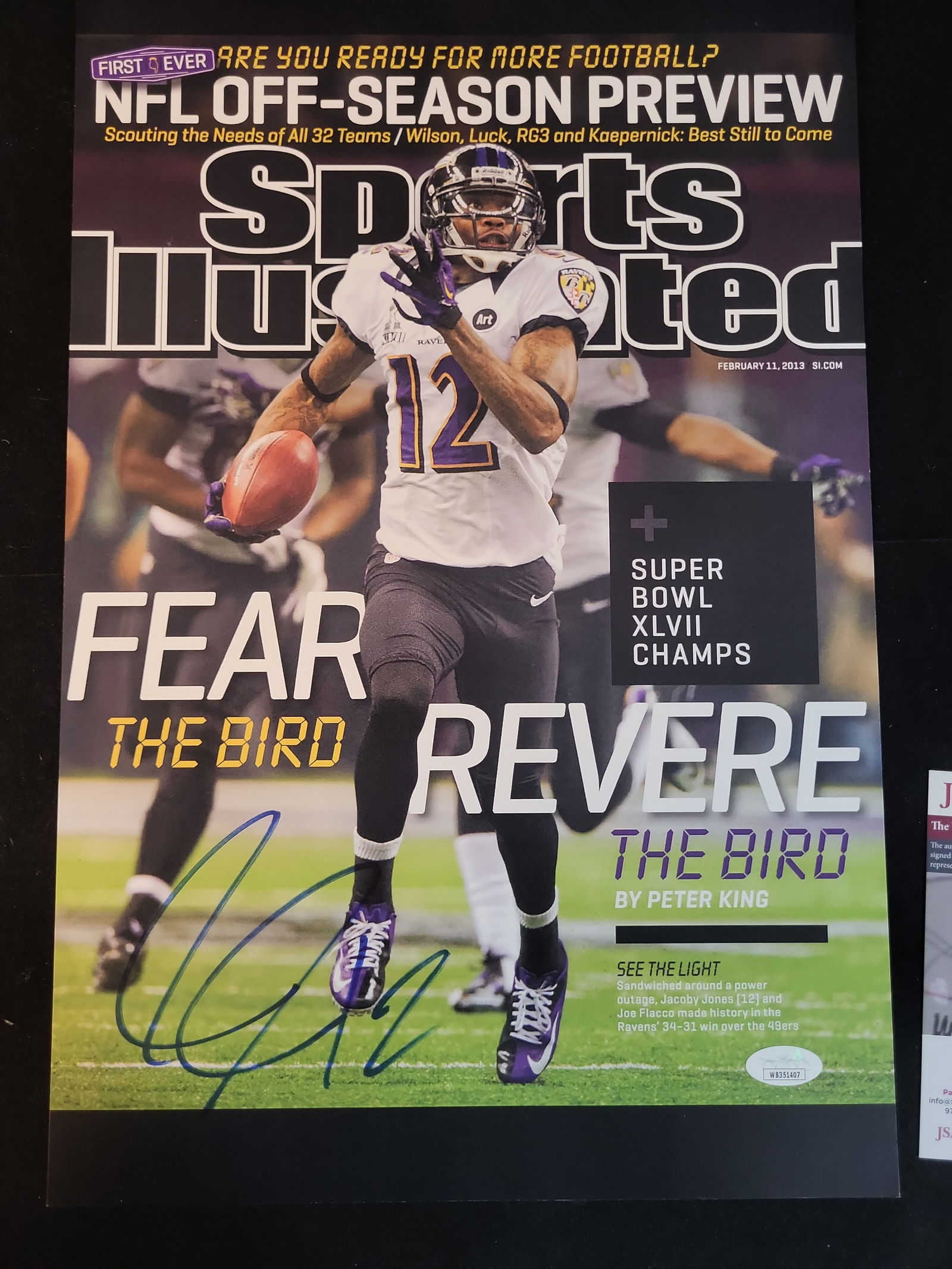 I00969 | Jacoby Jones Signed Sports Illustrated Magazine Cover, JSA Witnessed: BID PER WHAT YOU SEE IN THE PHOTO, NOT THE AI GENERATED TITLES AND DESCRIPTIONS! Jacoby Jones Signed Sports Illustrated Magazine Cover, JSA WitnessedThis lot features a Sports Illustrated magazine cov