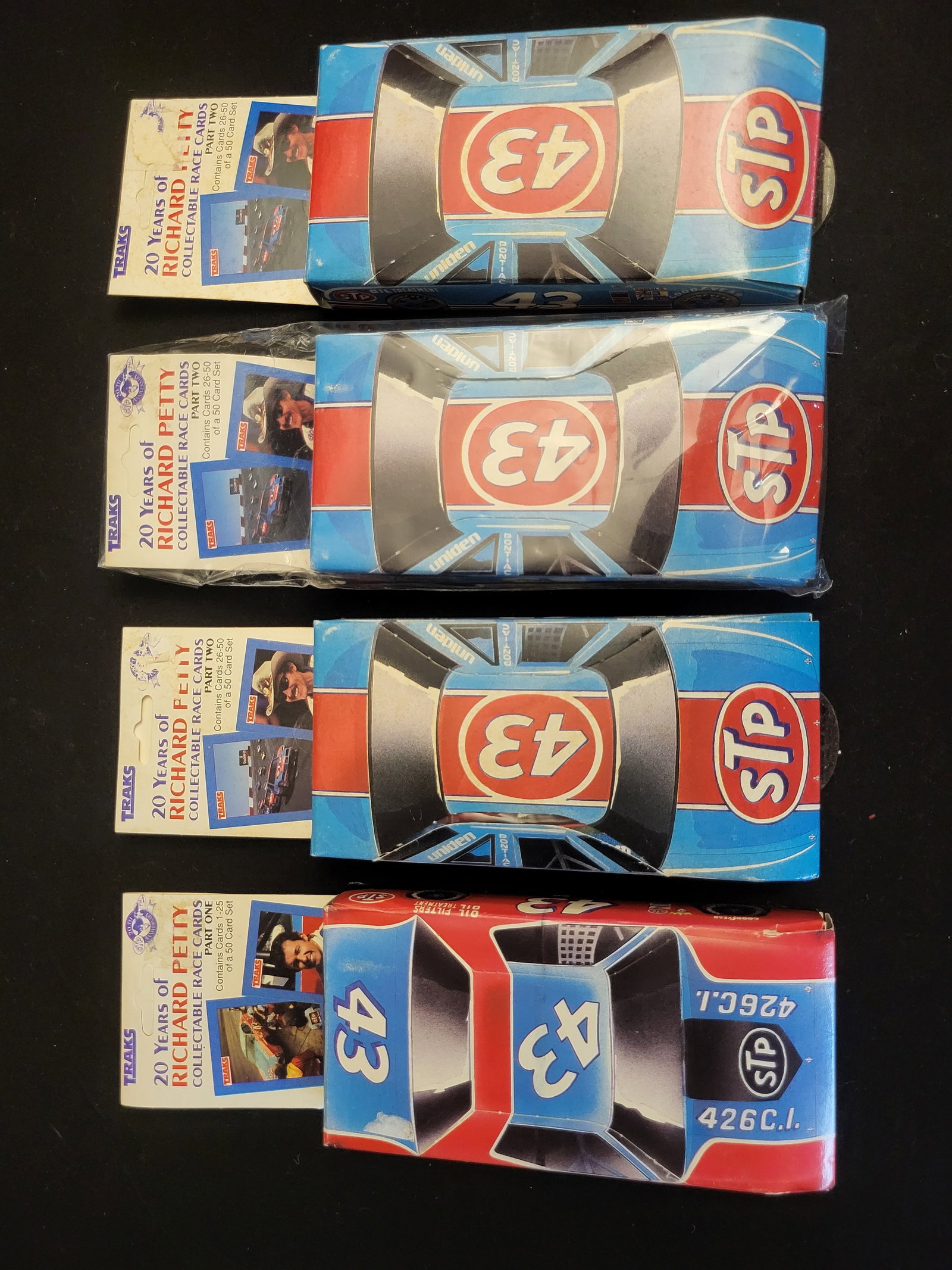 I00580 | Several Traks 20 Years of Richard Petty Collectible Race Card Sets: BID PER WHAT YOU SEE IN THE PHOTO, NOT THE AI GENERATED TITLES AND DESCRIPTIONS! Several Traks 20 Years of Richard Petty Collectible Race Card Sets A group of Traks Race Products, Inc. collectible rac