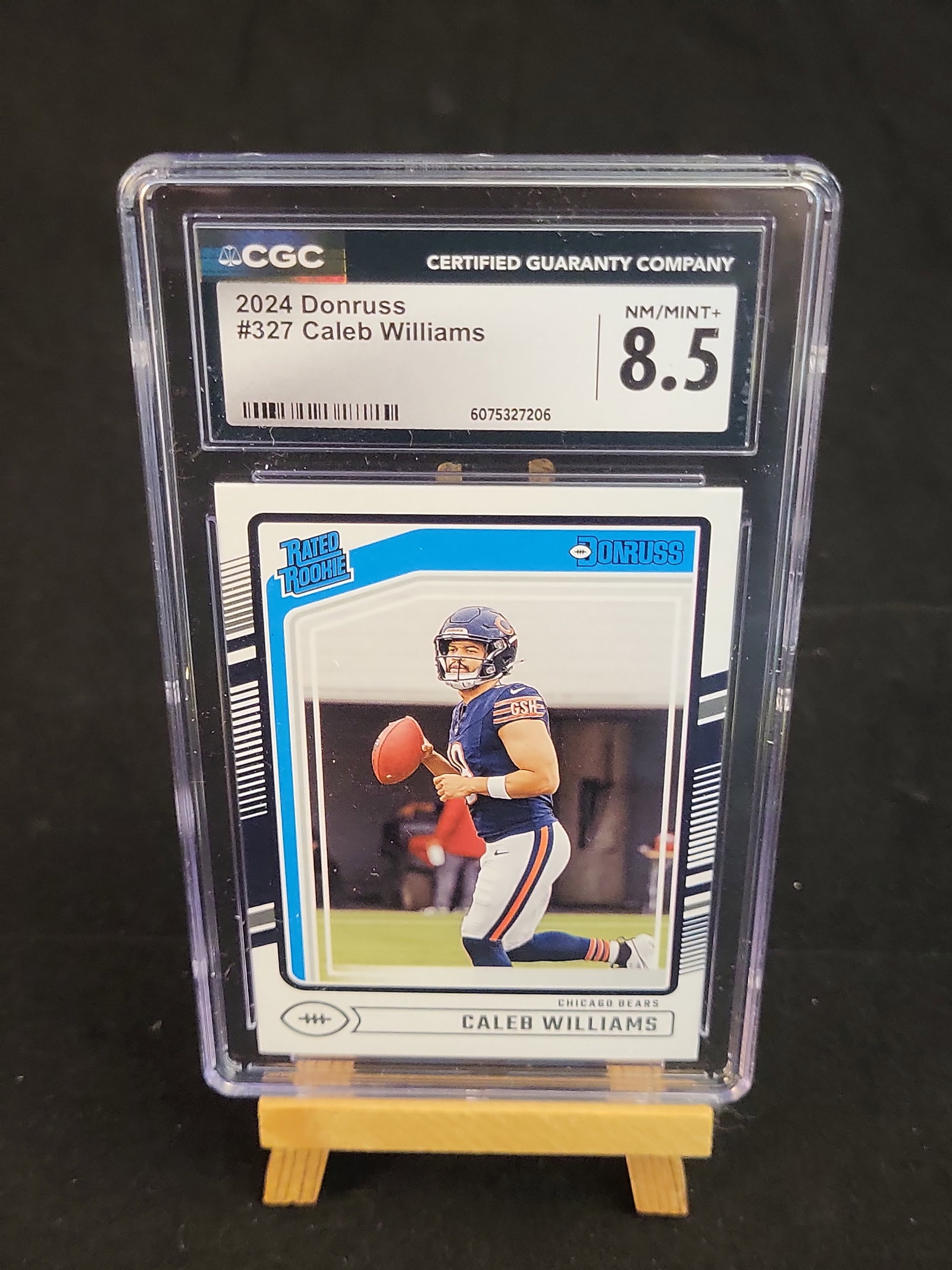 I00877 | NFL Caleb Williams 2024 Panini Donruss #327 Rated Rookie CGC 8.5: BID PER WHAT YOU SEE IN THE PHOTO, NOT THE AI GENERATED TITLES AND DESCRIPTIONS! NFL Caleb Williams 2024 Panini Donruss #327 Rated Rookie CGC 8.5 This professional auction listing is for a 2024 Panini