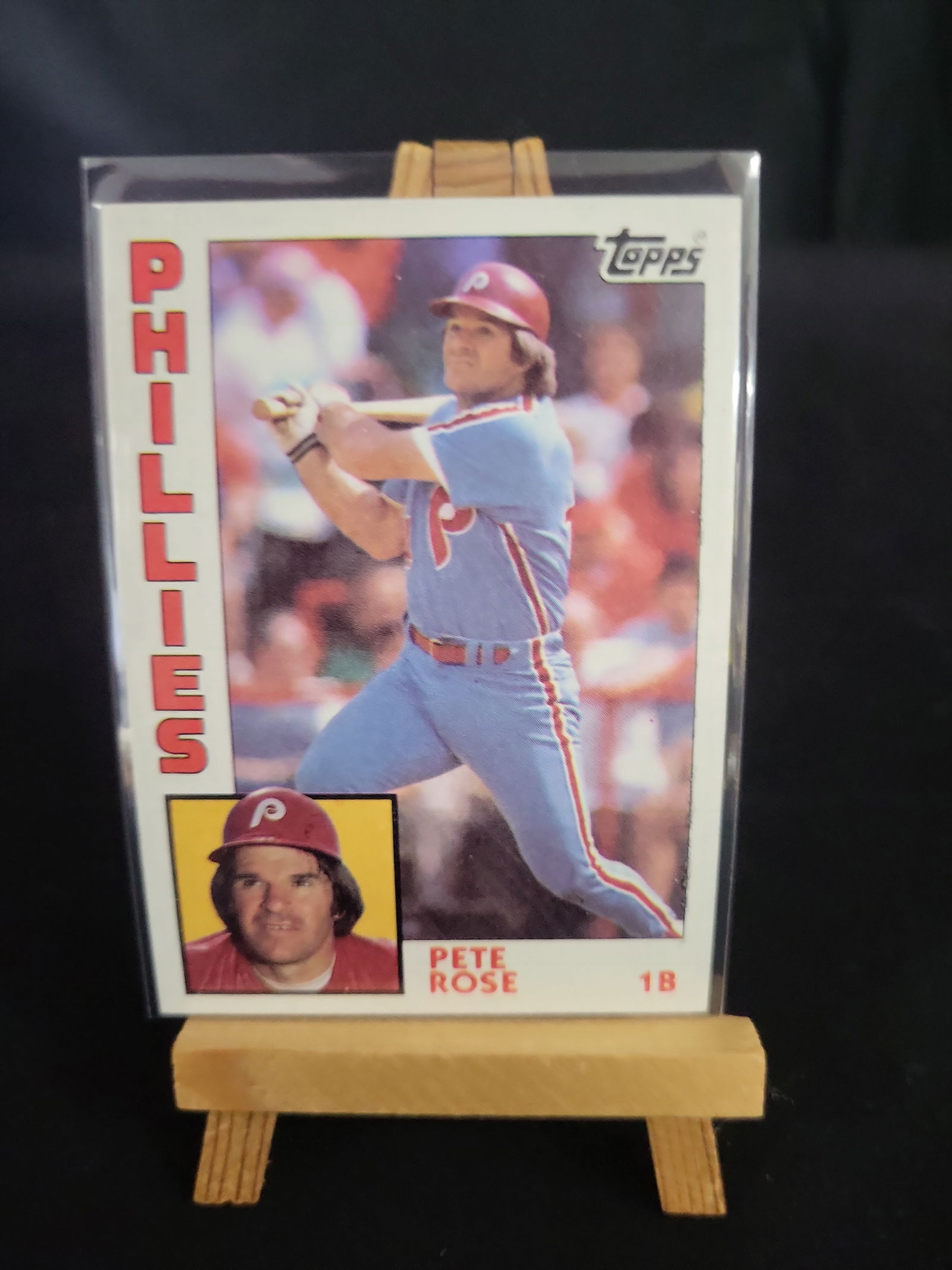 I01158 | 1984 Topps Pete Rose #300 Philadelphia Phillies Baseball Card: BID PER WHAT YOU SEE IN THE PHOTO, NOT THE AI GENERATED TITLES AND DESCRIPTIONS! 1984 Topps Pete Rose #300 Philadelphia Phillies Baseball Card This is a 1984 Topps baseball card featuring MLB all-time