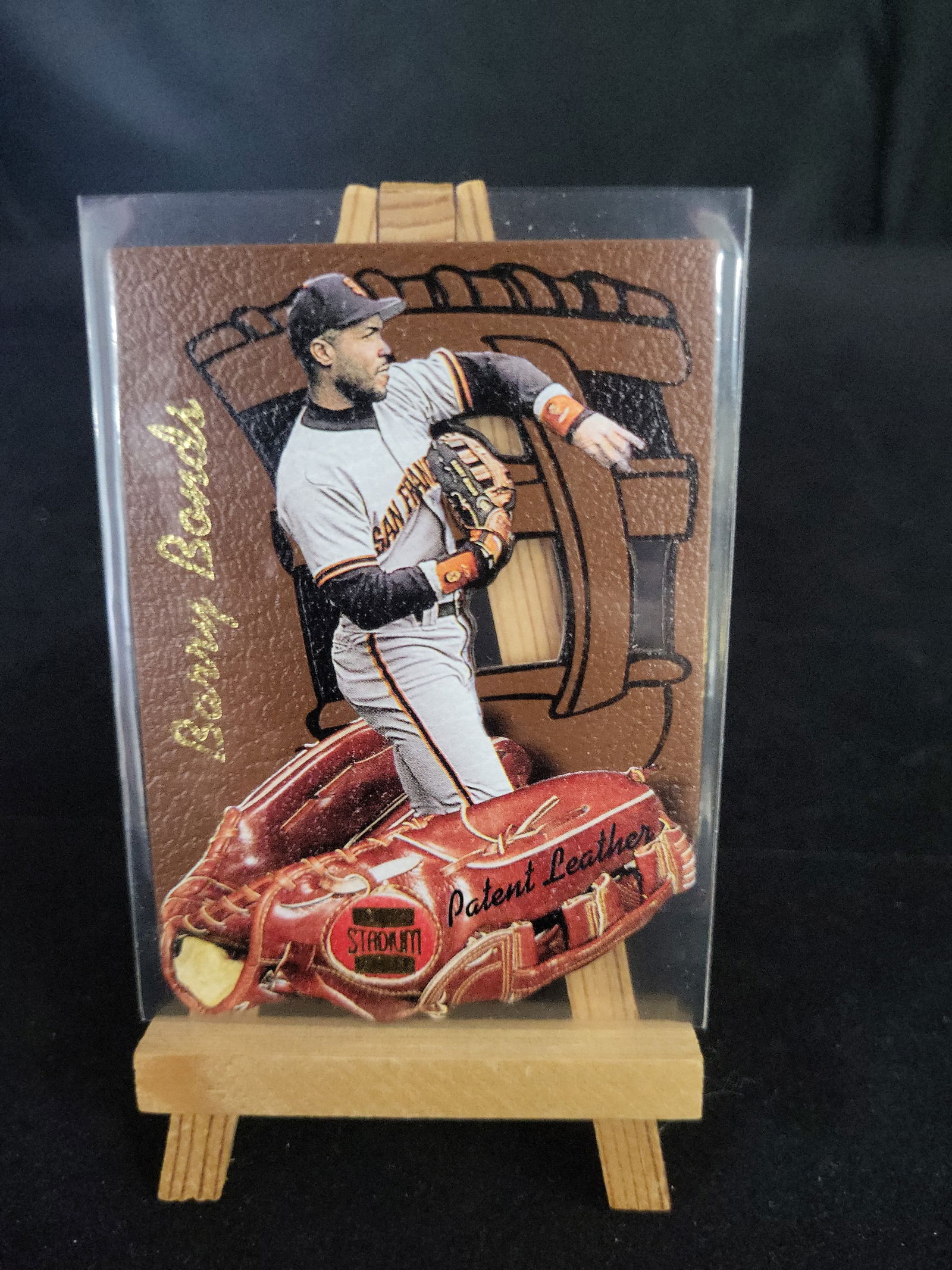 I01147 | MLB Baseball Barry Bonds 1997 Topps Stadium Club Patent Leather PL3 Die-Cut: BID PER WHAT YOU SEE IN THE PHOTO, NOT THE AI GENERATED TITLES AND DESCRIPTIONS! MLB Baseball Barry Bonds 1997 Topps Stadium Club Patent Leather PL3 Die-Cut This is a 1997 Topps Stadium Club Patent Le