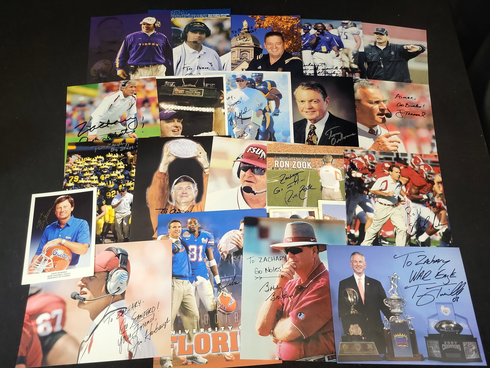 I01503 | A Collection of Autographed NCAA College Football Head Coach Photographs and Promotional: BID PER WHAT YOU SEE IN THE PHOTO, NOT THE AI GENERATED TITLES AND DESCRIPTIONS! A Collection of Autographed NCAA College Football Head Coach Photographs and Promotional Cards This lot comprises appro