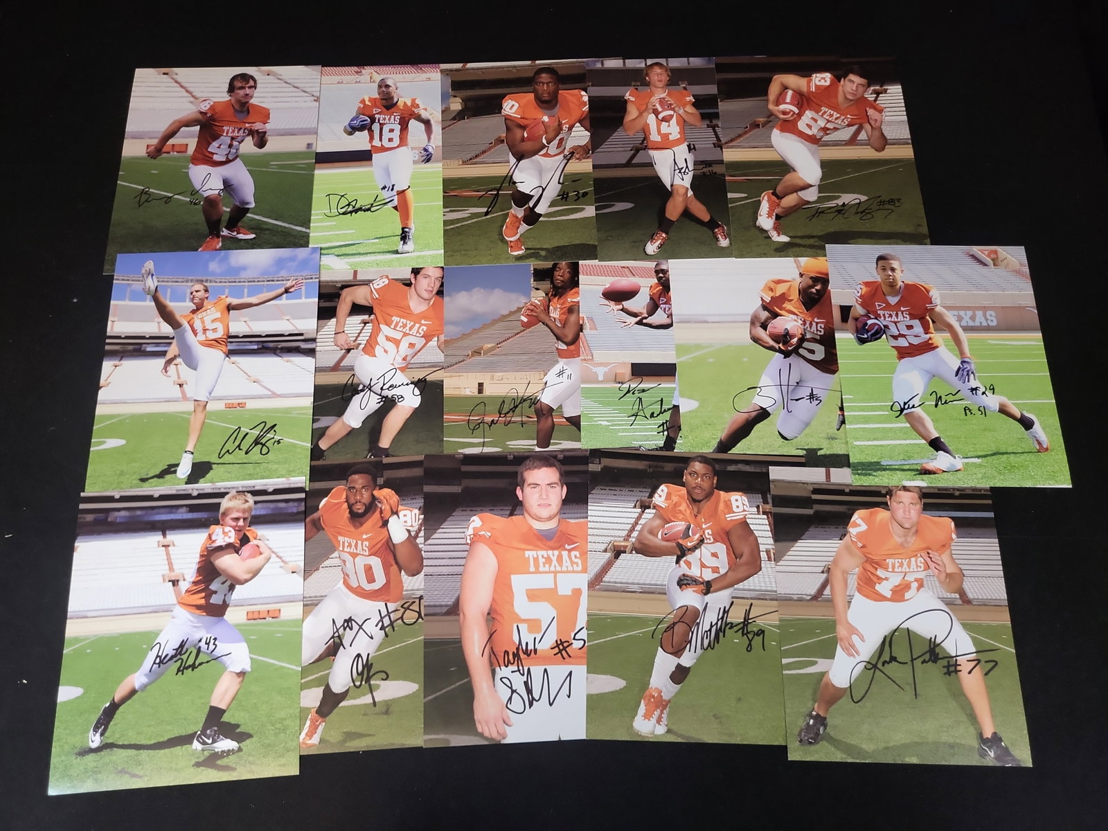 I01457 | A Collection of Sixteen Hand-Signed University of Texas Longhorns Football Publicity: BID PER WHAT YOU SEE IN THE PHOTO, NOT THE AI GENERATED TITLES AND DESCRIPTIONS! A Collection of Sixteen Hand-Signed University of Texas Longhorns Football Publicity Photographs This collection consis