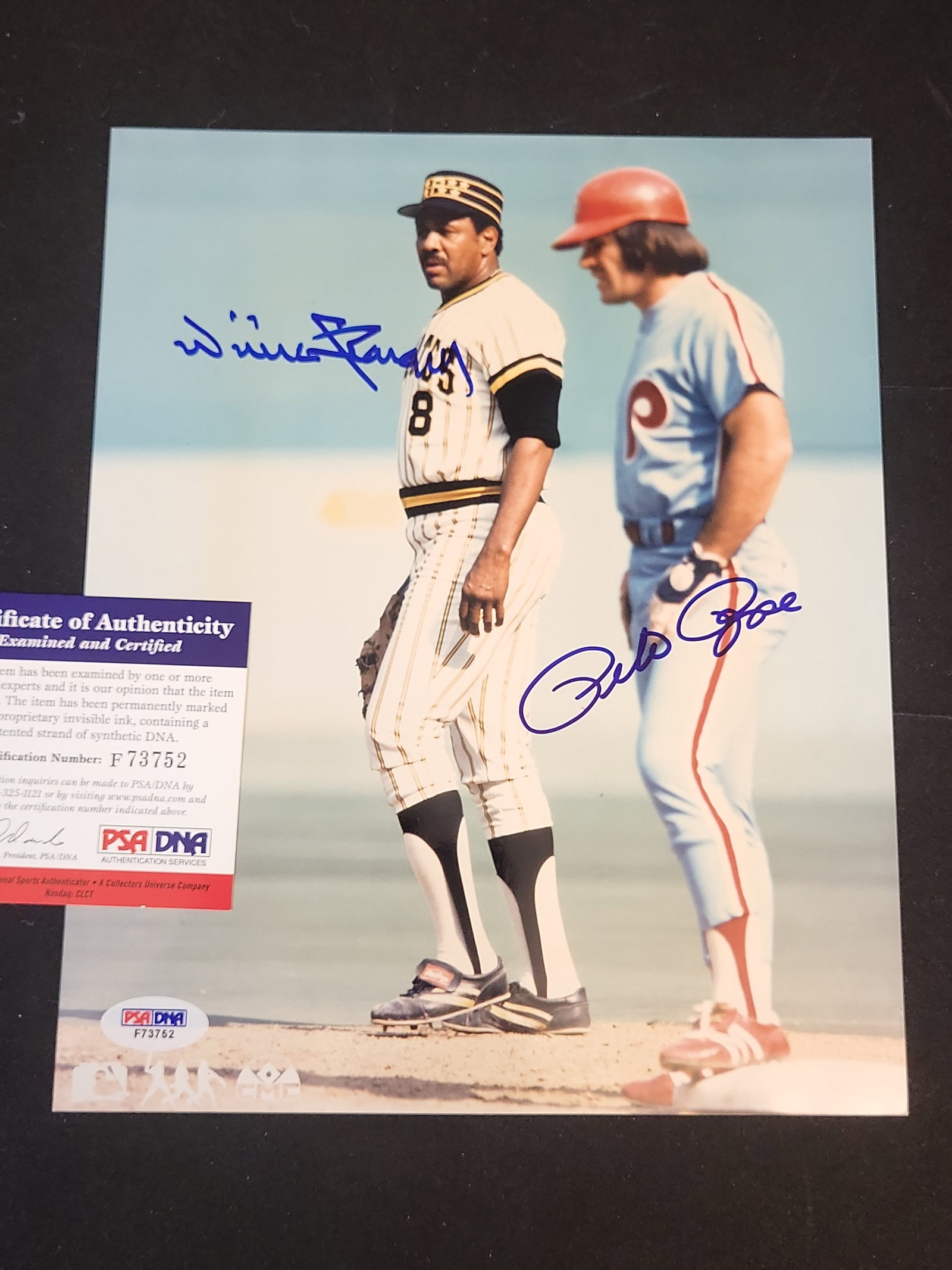 I01528 | Mike Schmidt and Willie Stargell Dual-Signed 8 x 10 Inch Color Photograph with PSA/DNA: BID PER WHAT YOU SEE IN THE PHOTO, NOT THE AI GENERATED TITLES AND DESCRIPTIONS! Mike Schmidt and Willie Stargell Dual-Signed 8 x 10 Inch Color Photograph with PSA/DNA Authentication This lot features