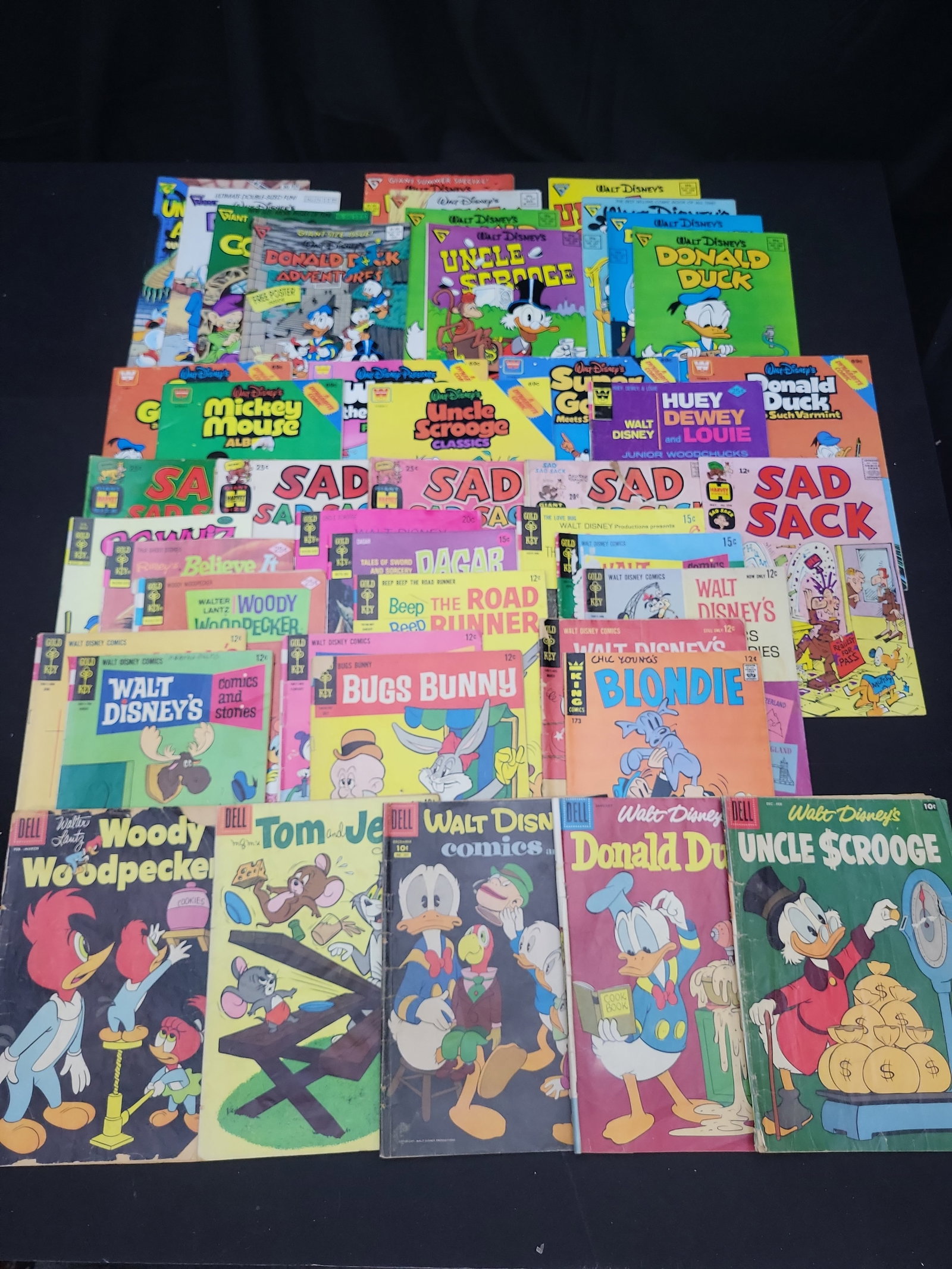 I02092 | A Collection of Approximately 40-50 Vintage Comic Books Including Walt Disney, Dell, and (1 of 6)