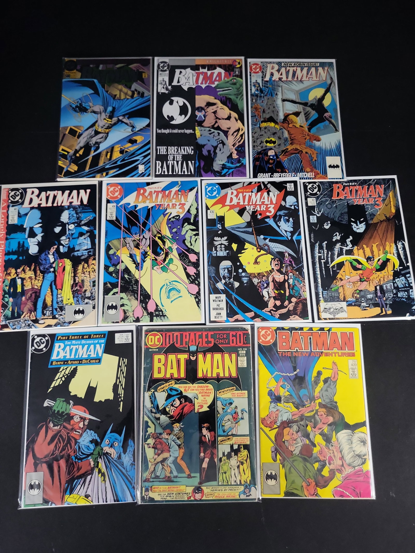 I02132 | A Collection of Twelve DC Comics Batman Issues Including Key First Appearances and: BID PER WHAT YOU SEE IN THE PHOTO, NOT THE AI GENERATED TITLES AND DESCRIPTIONS! A Collection of Twelve DC Comics Batman Issues Including Key First Appearances and Knightfall Arc A collection of twelv